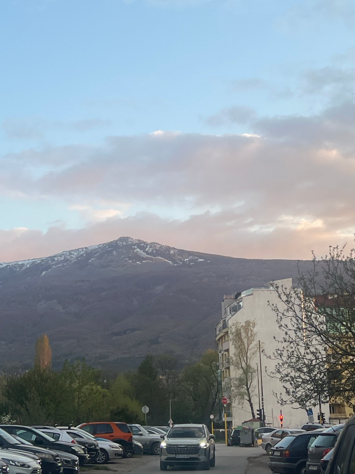 Sofia street scene captured with Vitosha Mountain backdrop