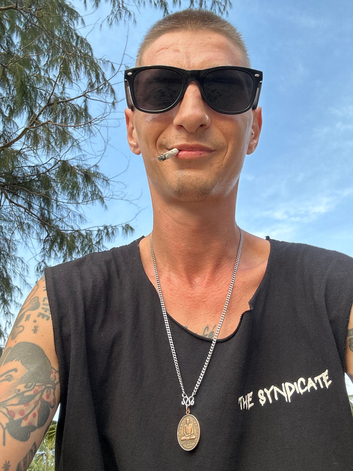 Lazy morning on Karon Beach — sunsets, smoke, and a metal detector