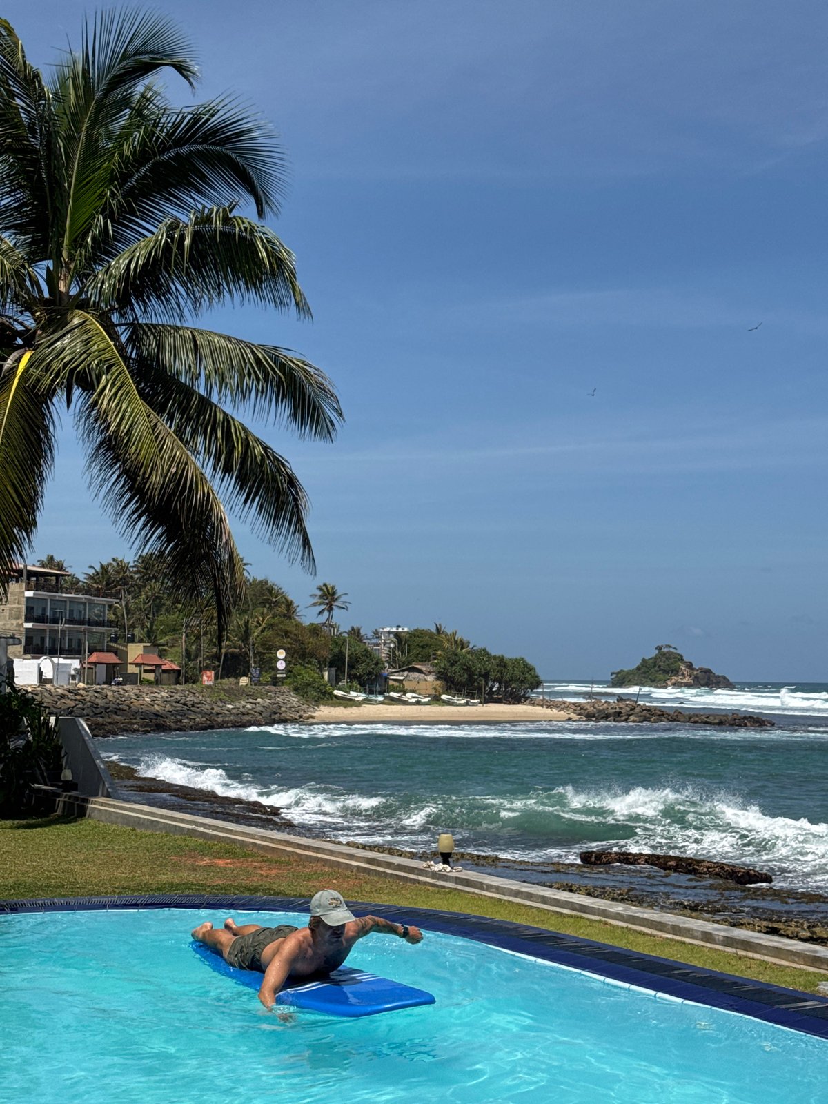 Lazy pool morning at a Sri Lanka resort with ocean views