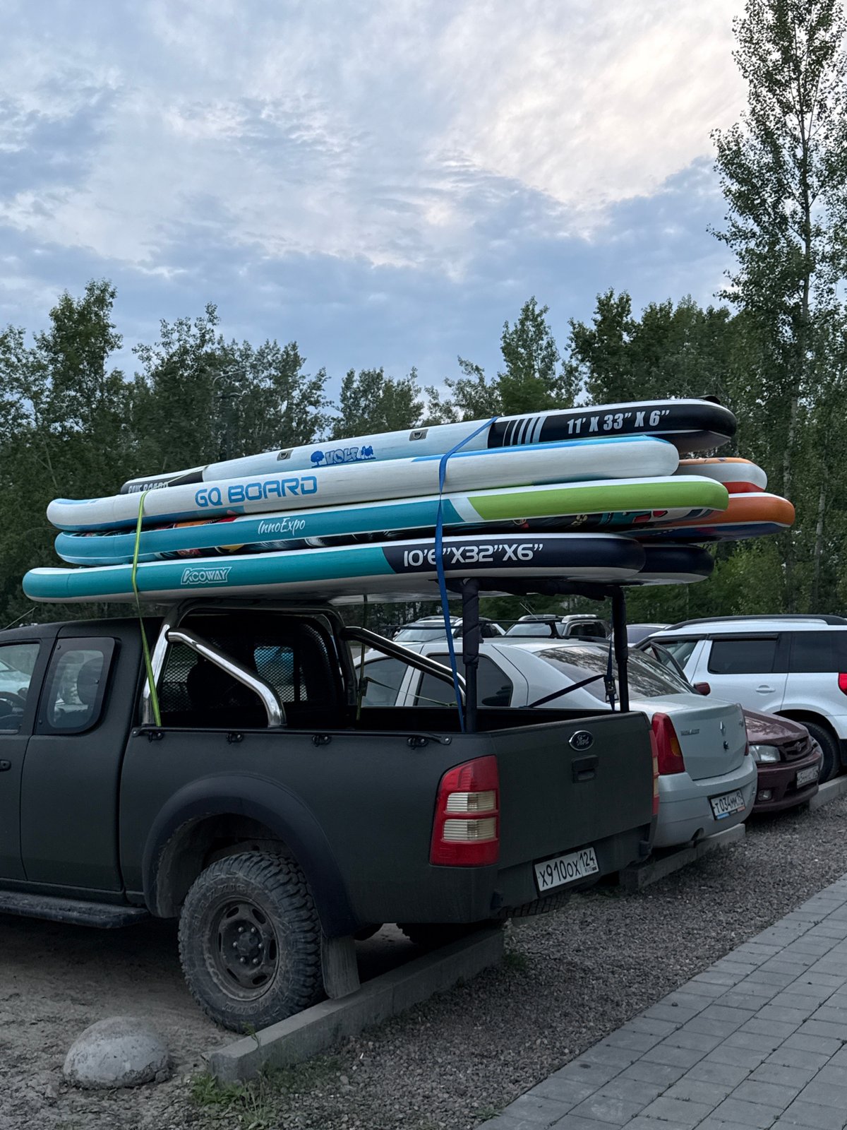 Summer paddleboarding and riverside life on the Yenisei