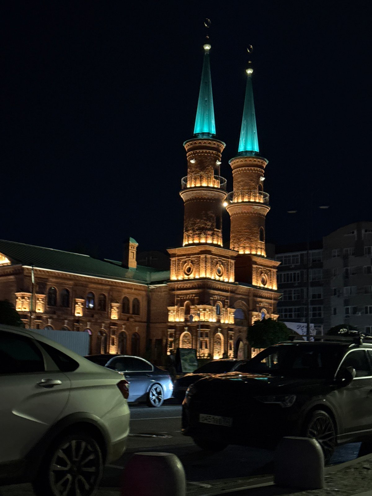 Evening stroll captures illuminated Ufa Cathedral Mosque district
