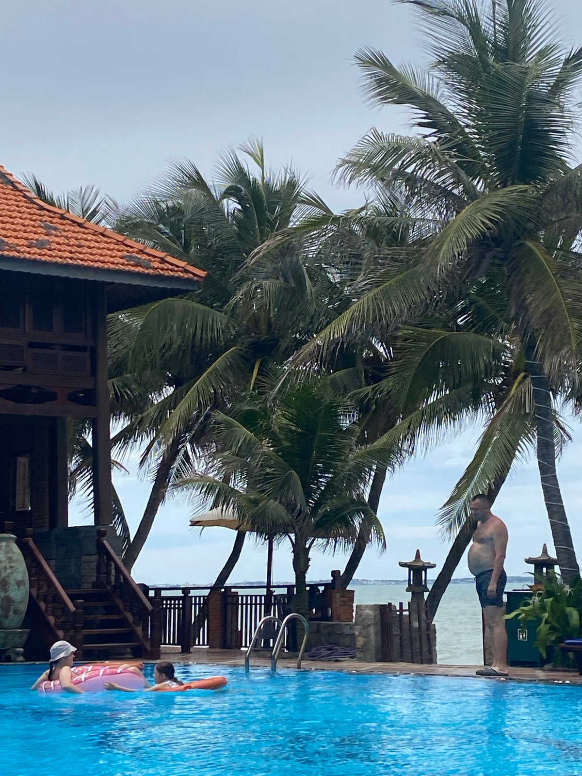 Pool day at a Vietnam beach resort, hermit crabs included.