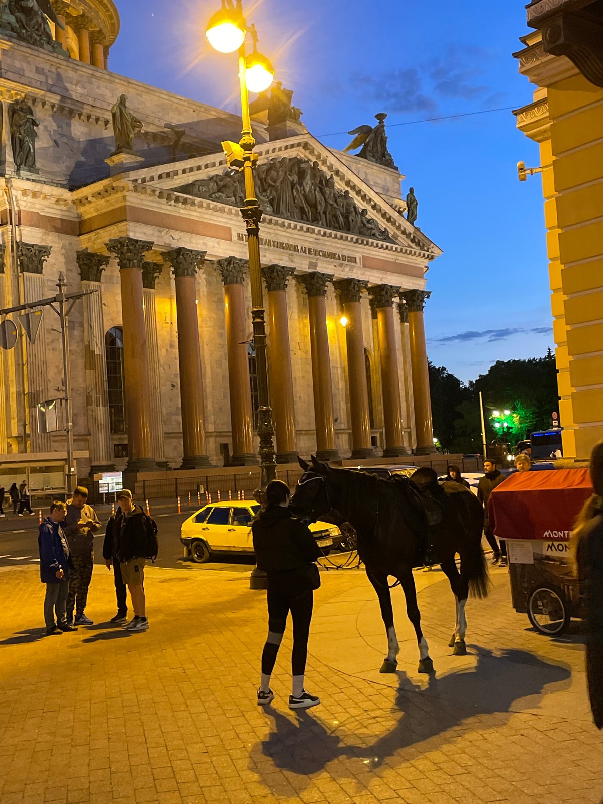 St. Petersburg landmarks illuminated in Russian flag colors