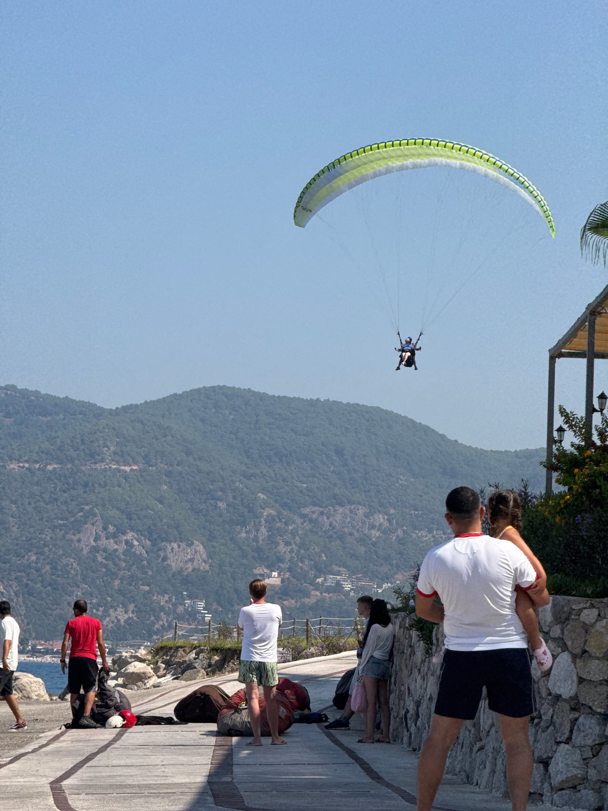 Paragliding and crashing waves along the Fethiye coast
