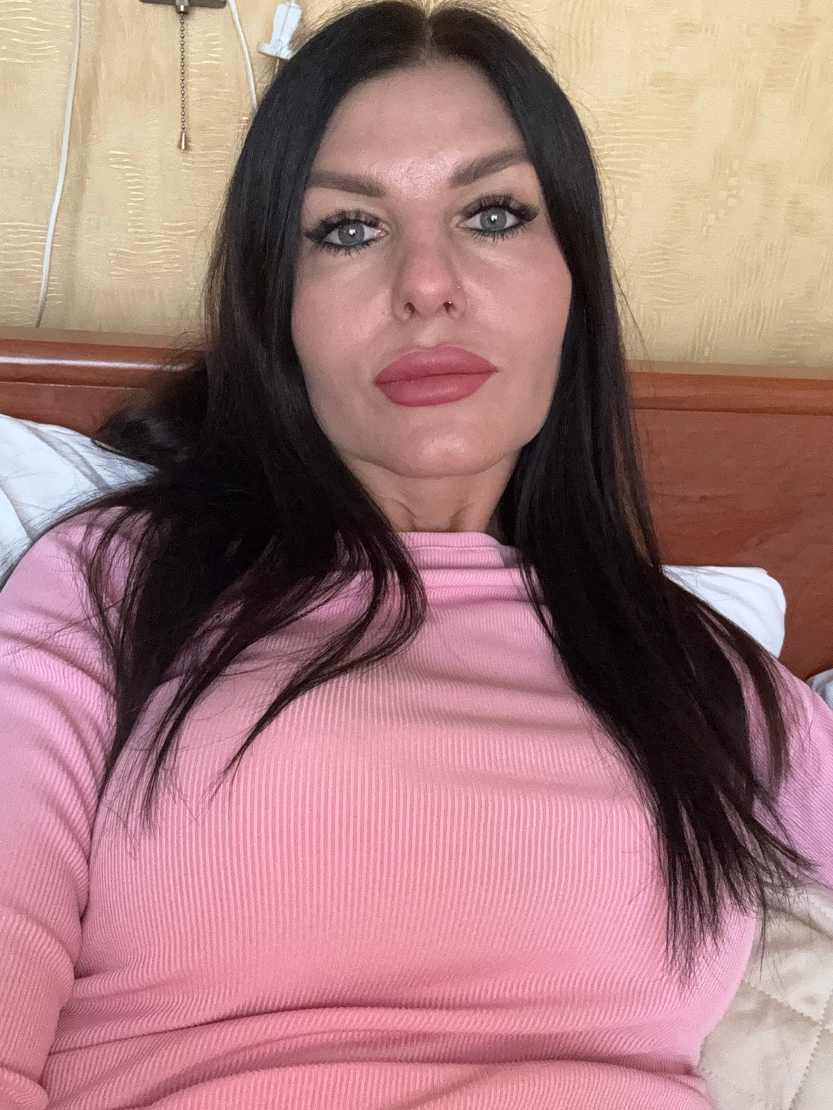 Woman in pink shirt observed in Kungur residence