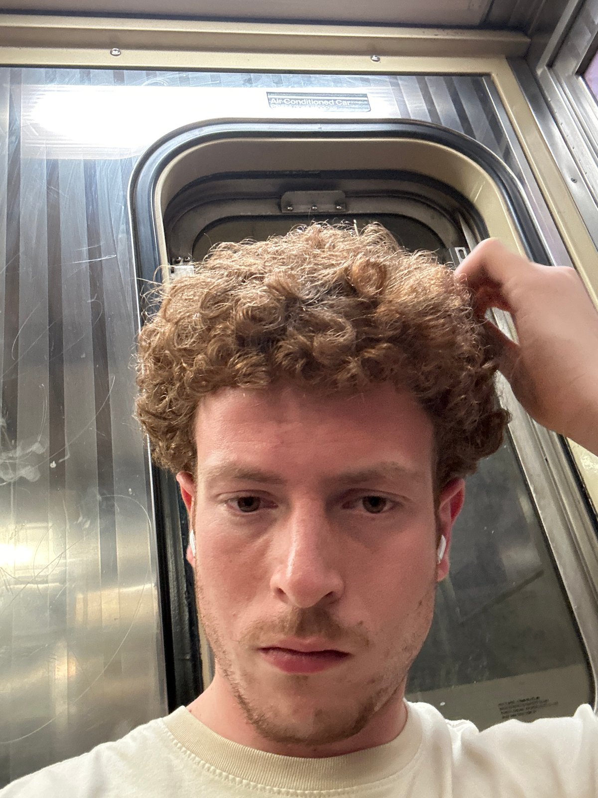Man takes selfie on New York subway car