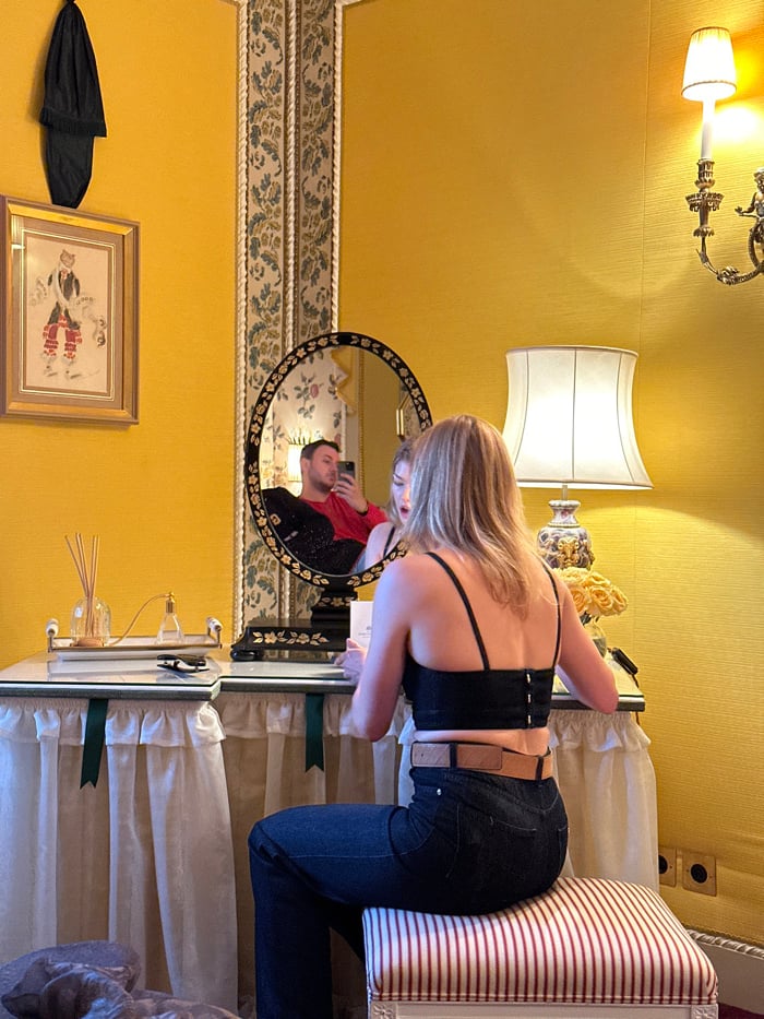 Professional photoshoot filmed behind-the-scenes in ornate London room