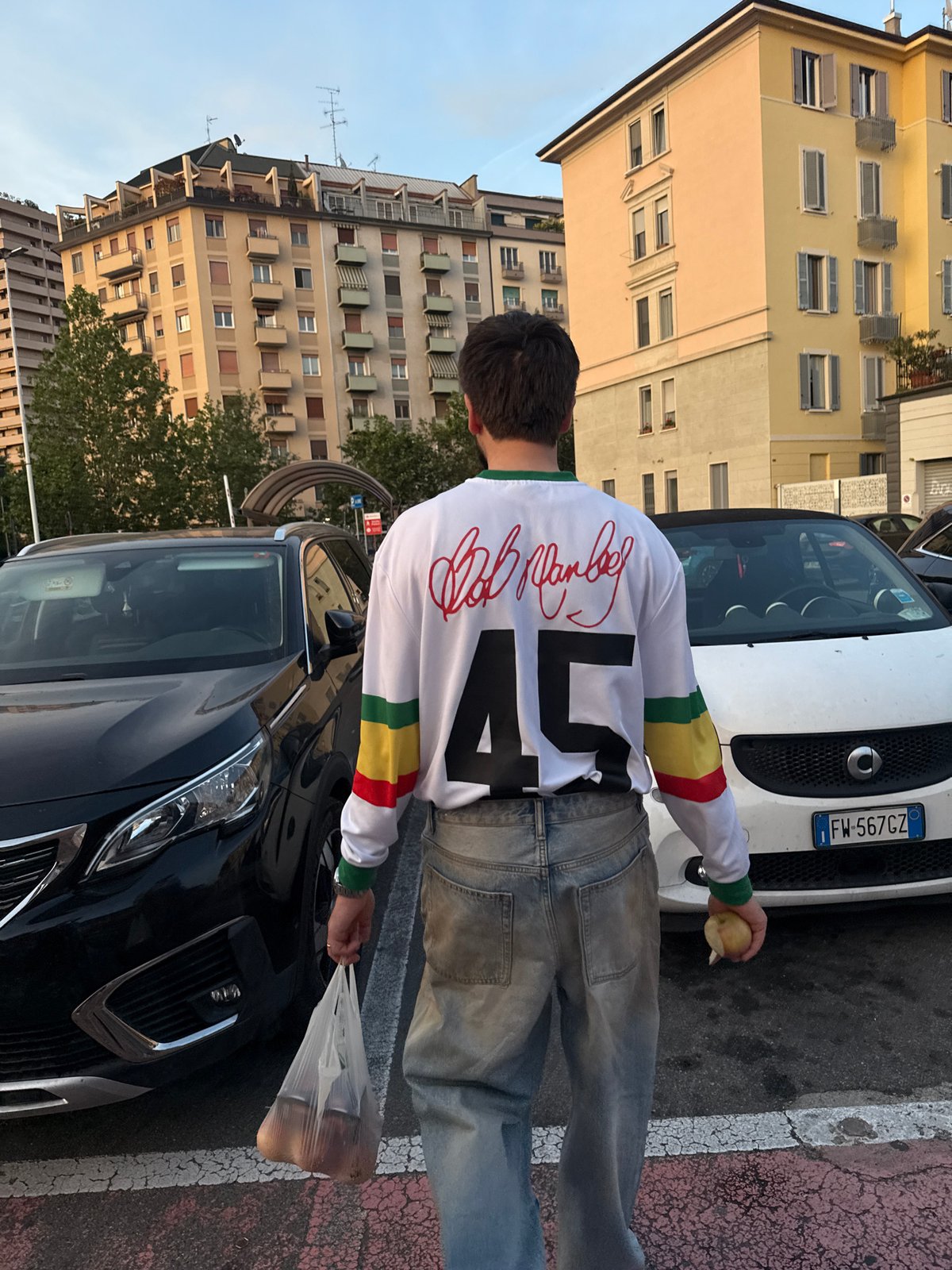 Man in numbered sports jersey spotted in Milan