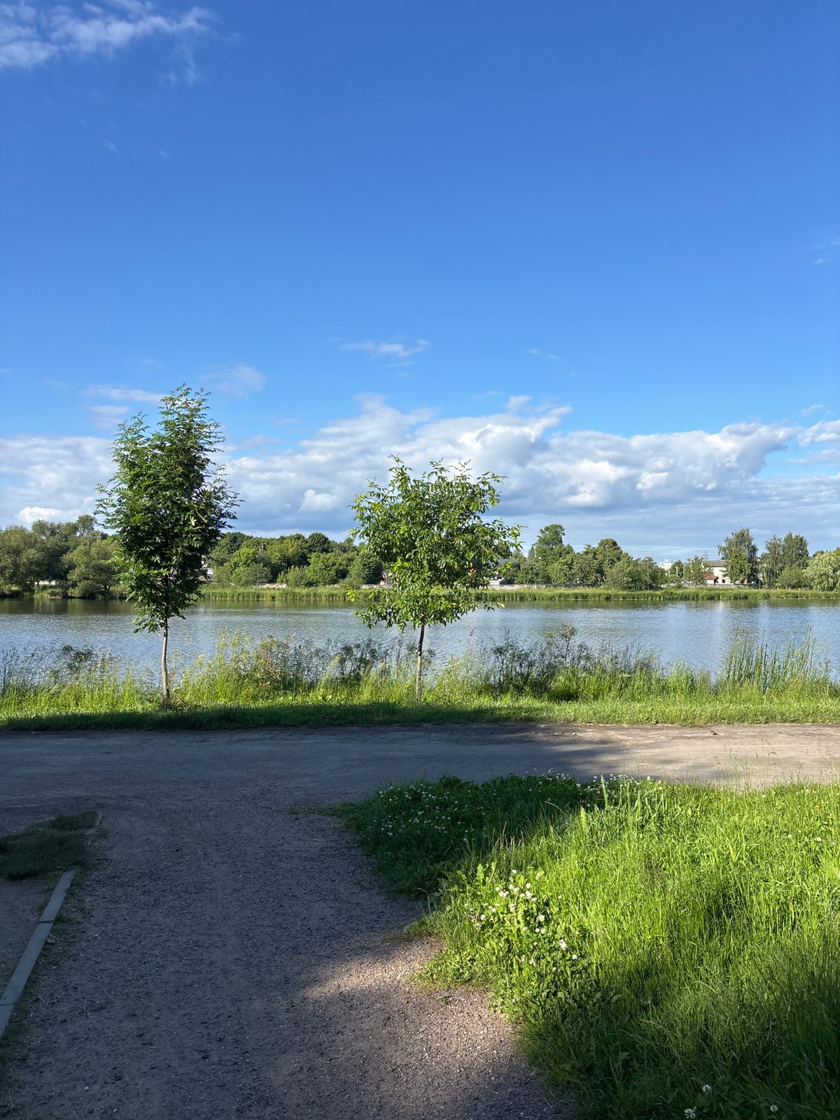 Sunny afternoon along Minsk's waterfront and surrounding neighborhood