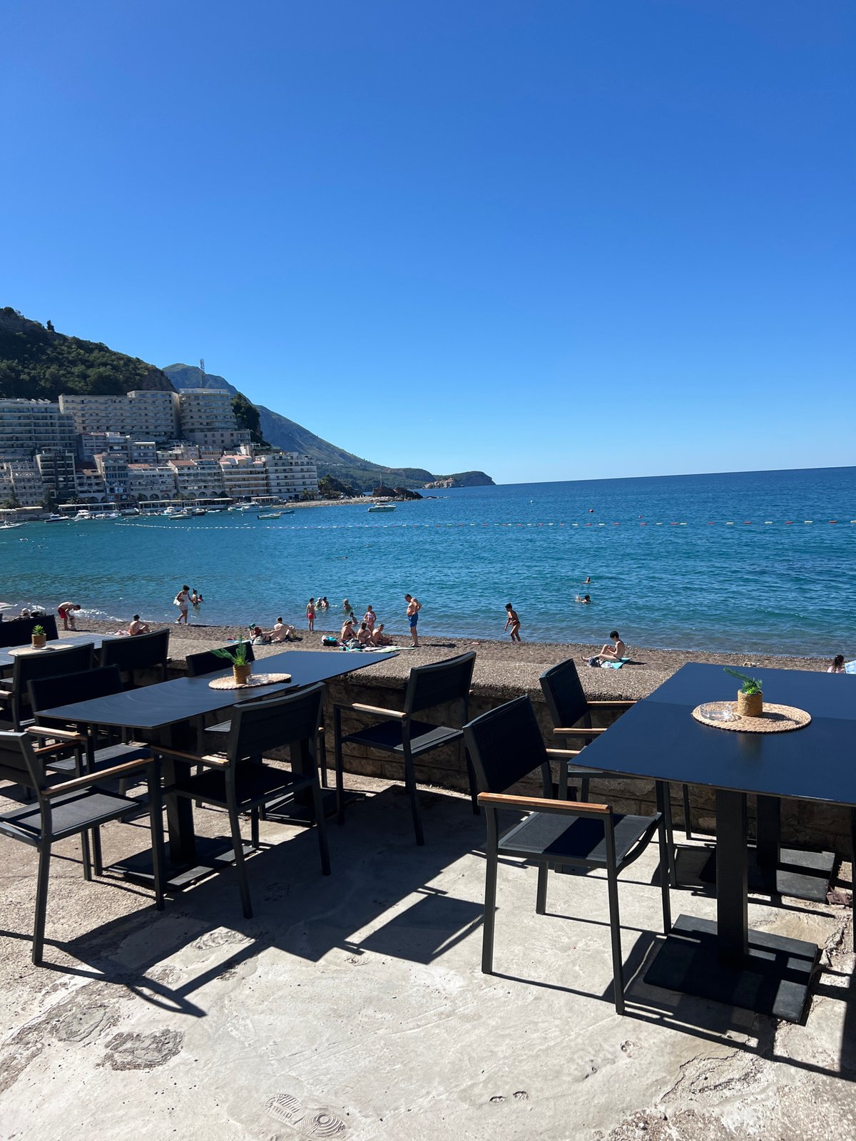 Morning coastal life unfolds in Montenegro beach towns