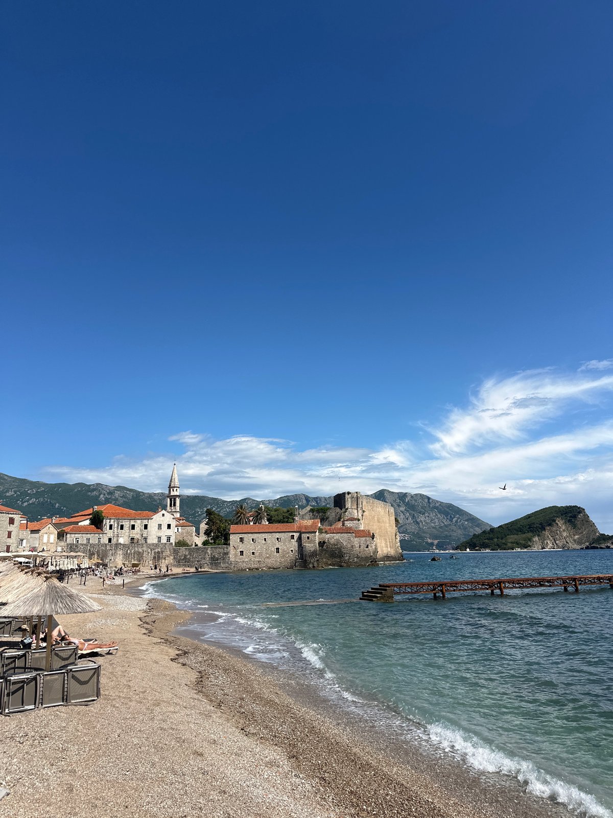 Tourist explores Budva's old town, beaches and landmarks