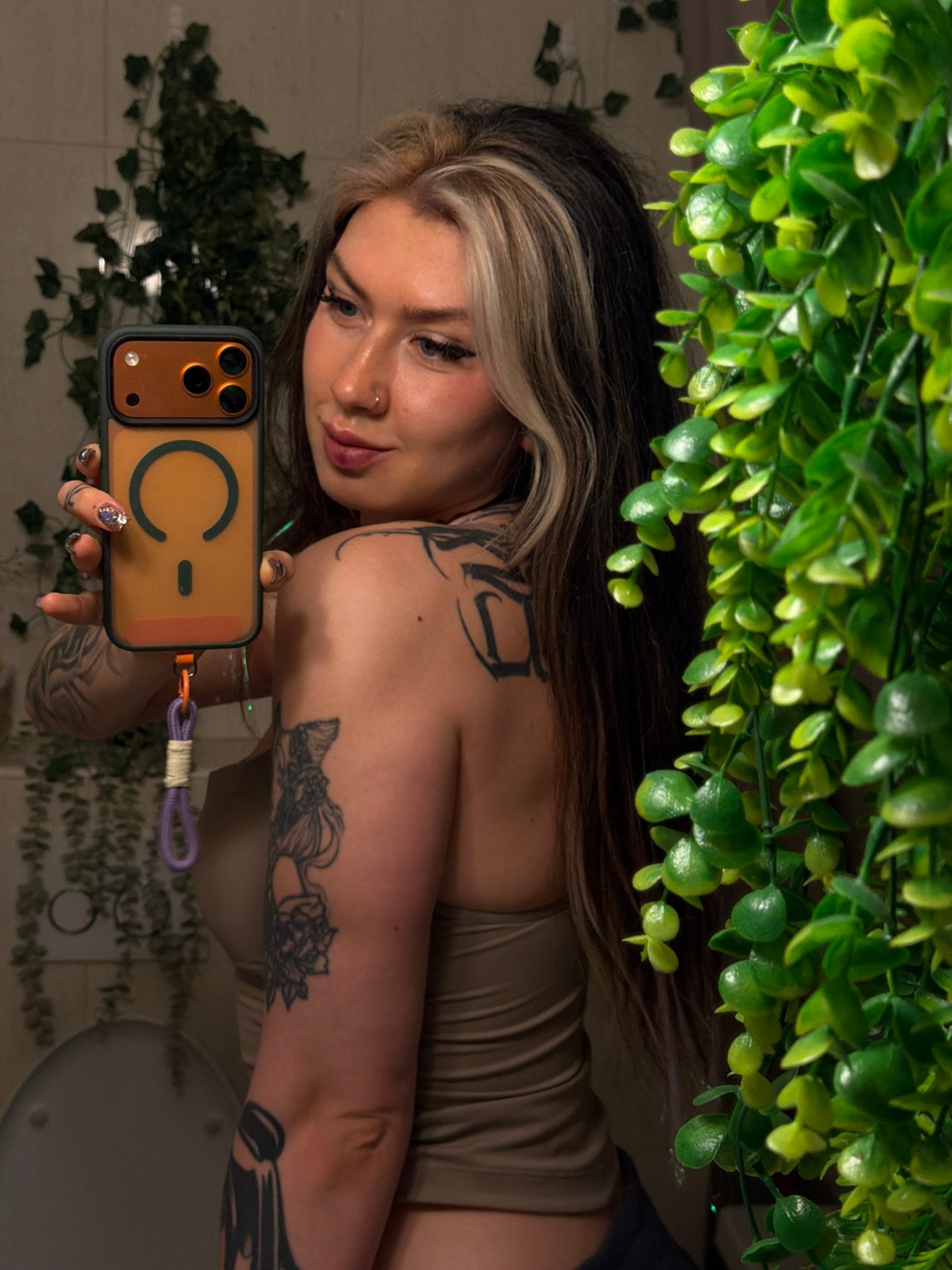 Woman takes bathroom selfies in Budva, Montenegro