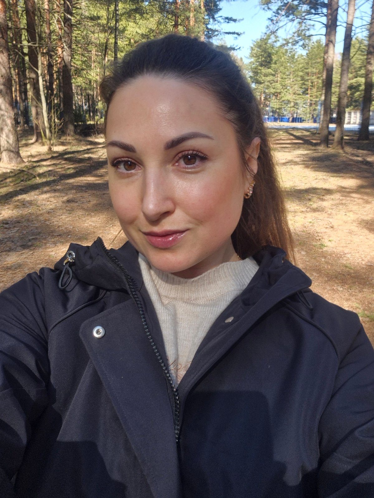 Forest visitors document nature walk with selfies and scenery