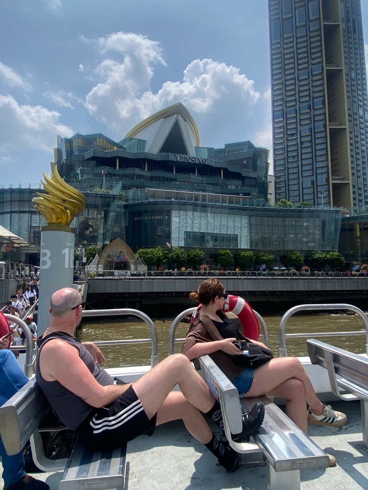 River boat passengers view Bangkok's ICONSIAM mall from Chao Phraya