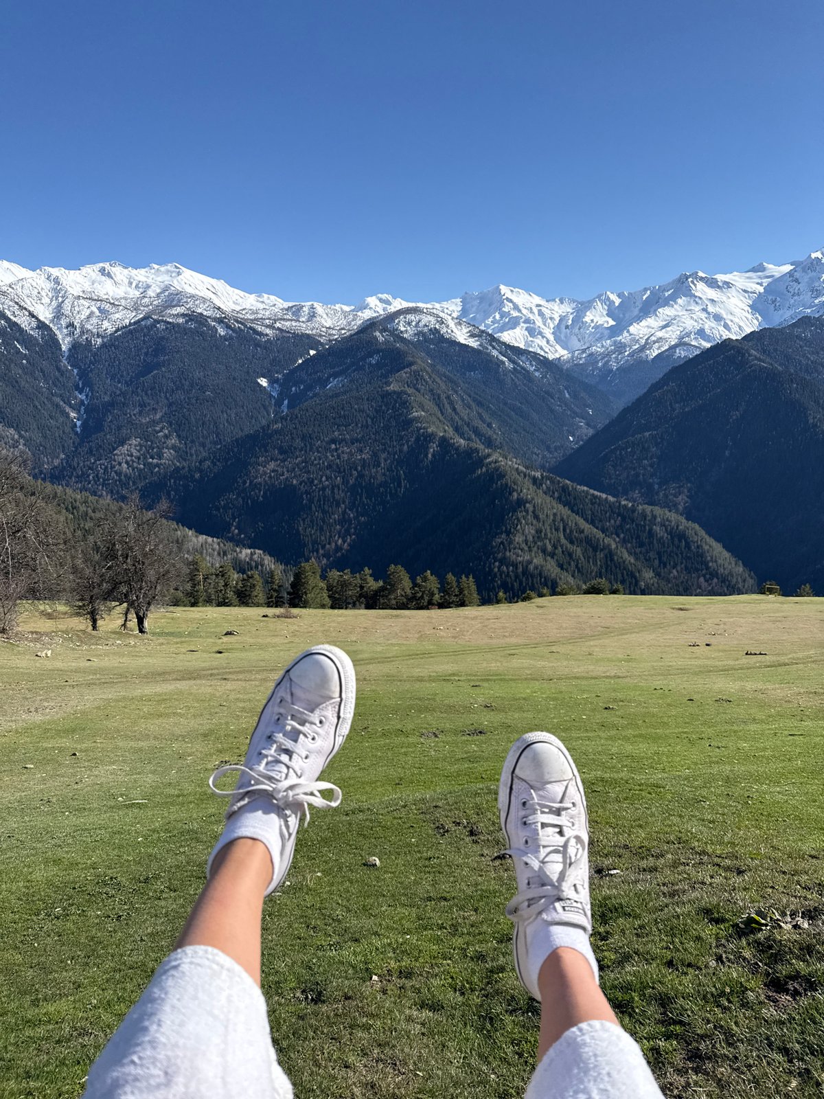 Hiker captures serene mountain view in Lenjeri, Georgia