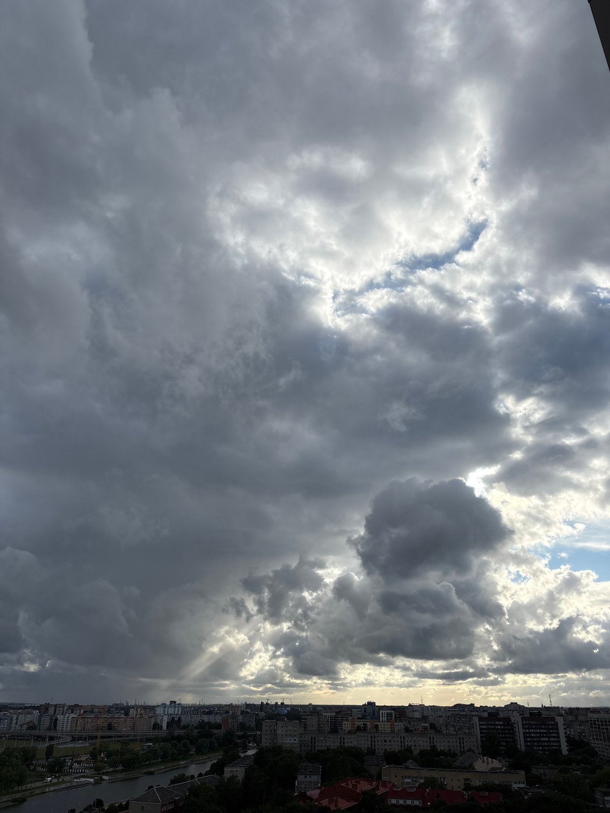 Storm clouds and laptops in Kaliningrad afternoon