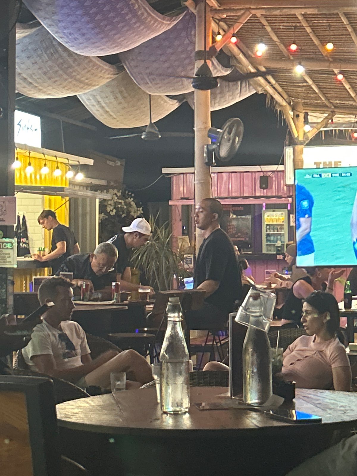 Kuta nights: bars, soccer screens, and street food stalls