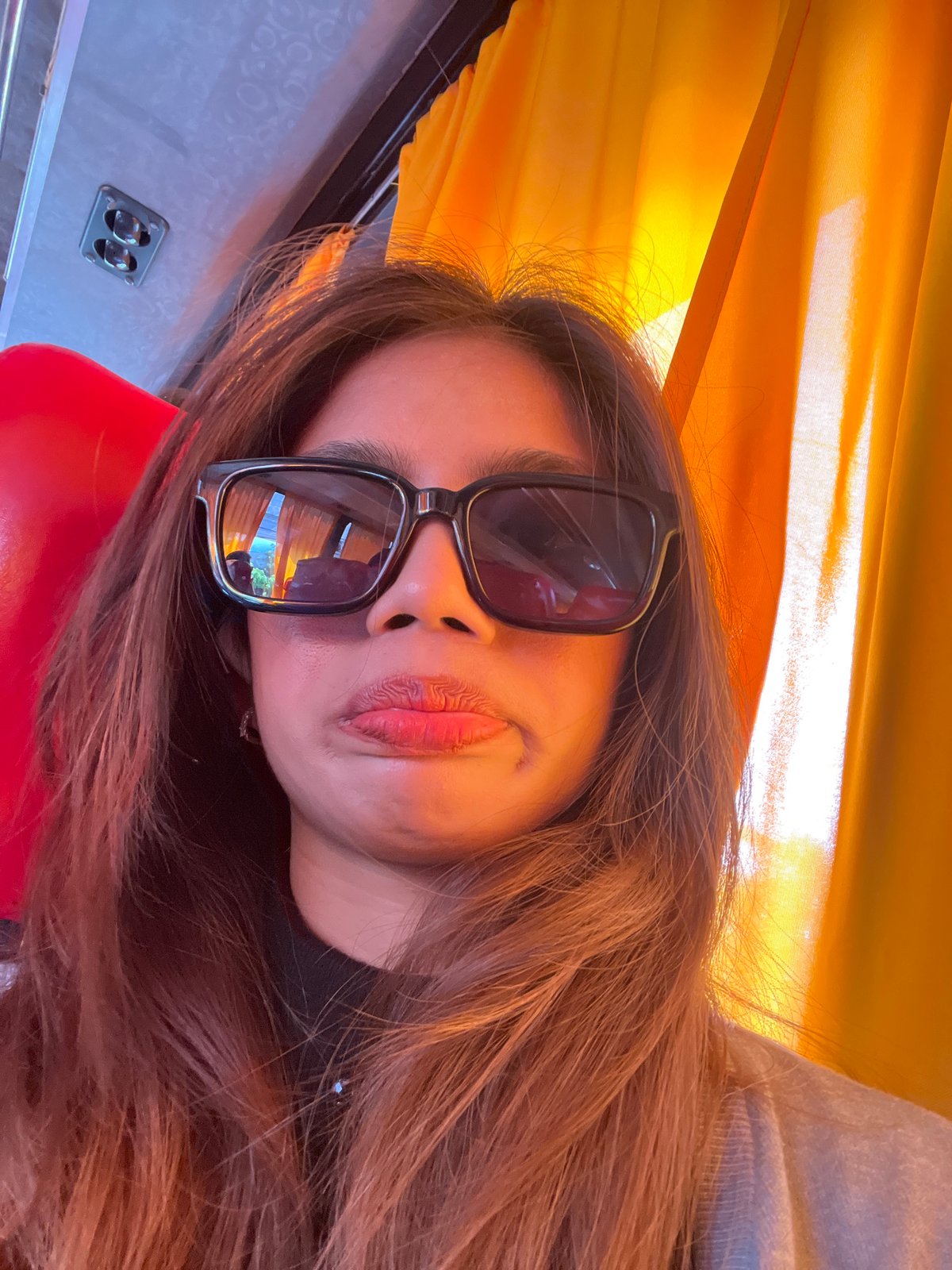 Woman takes playful selfies on public transport in Tagum