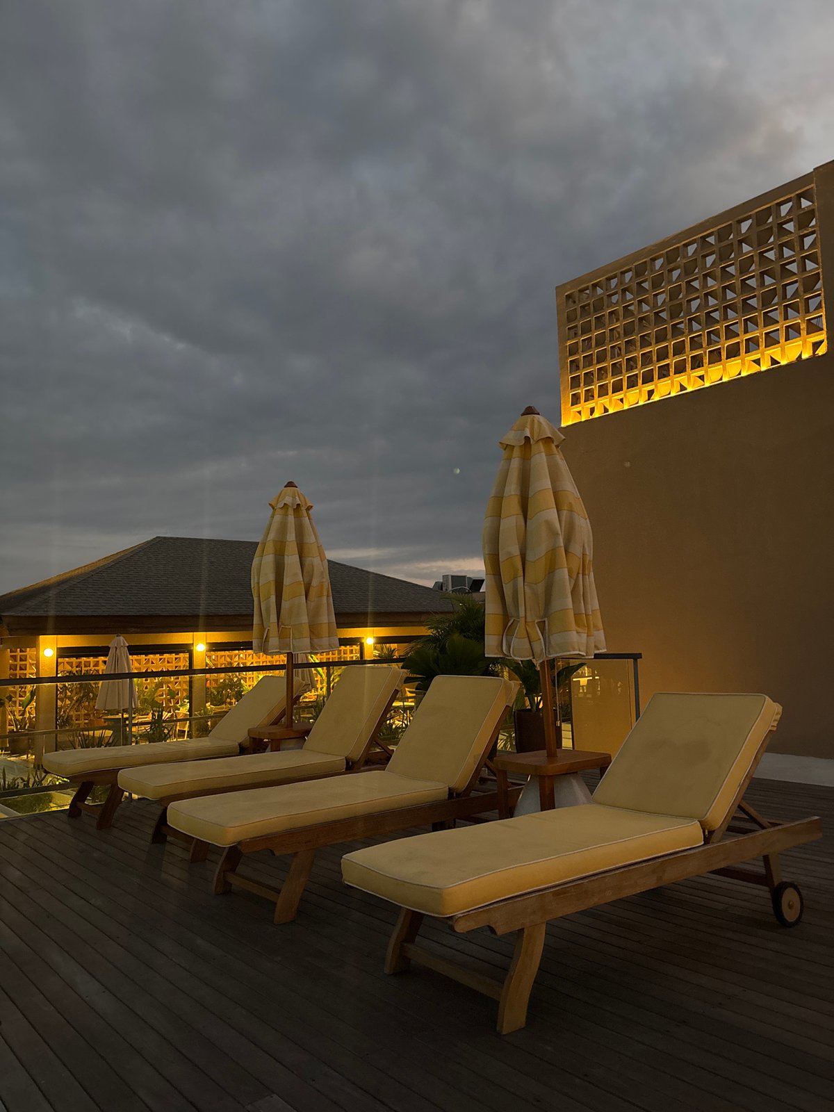 Rooftop drinks and beachside dining at sunset in North Kuta
