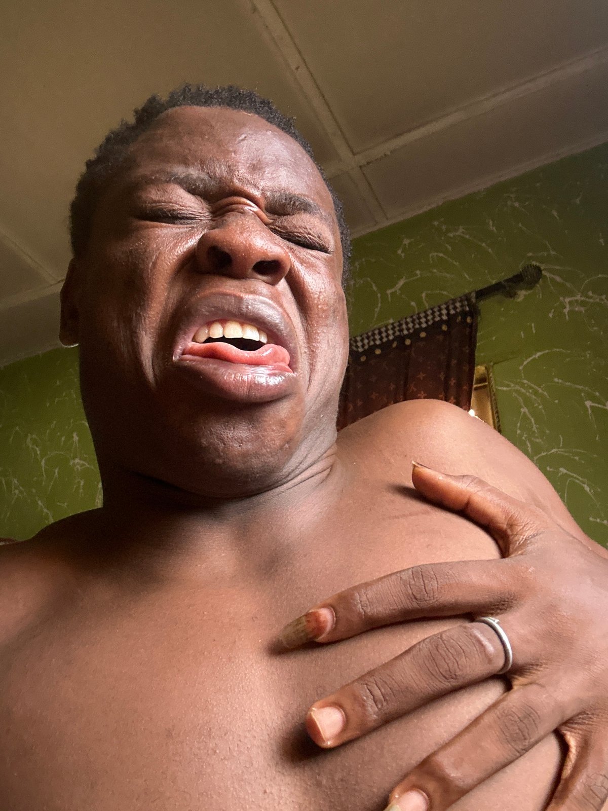 Individual captured in series of expressive portrait photographs