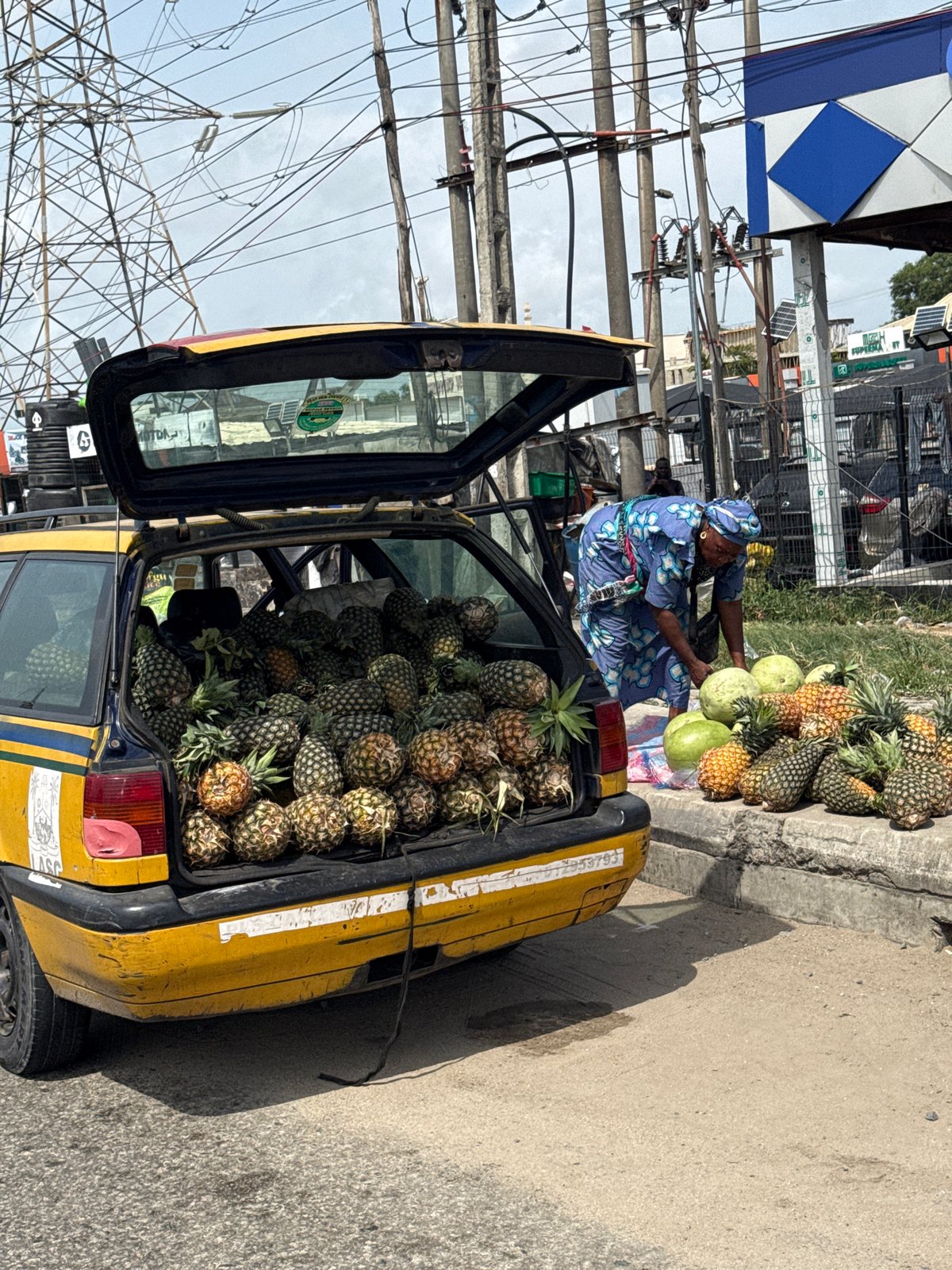 Woman operates fruit stand in Lekki, Nigeria