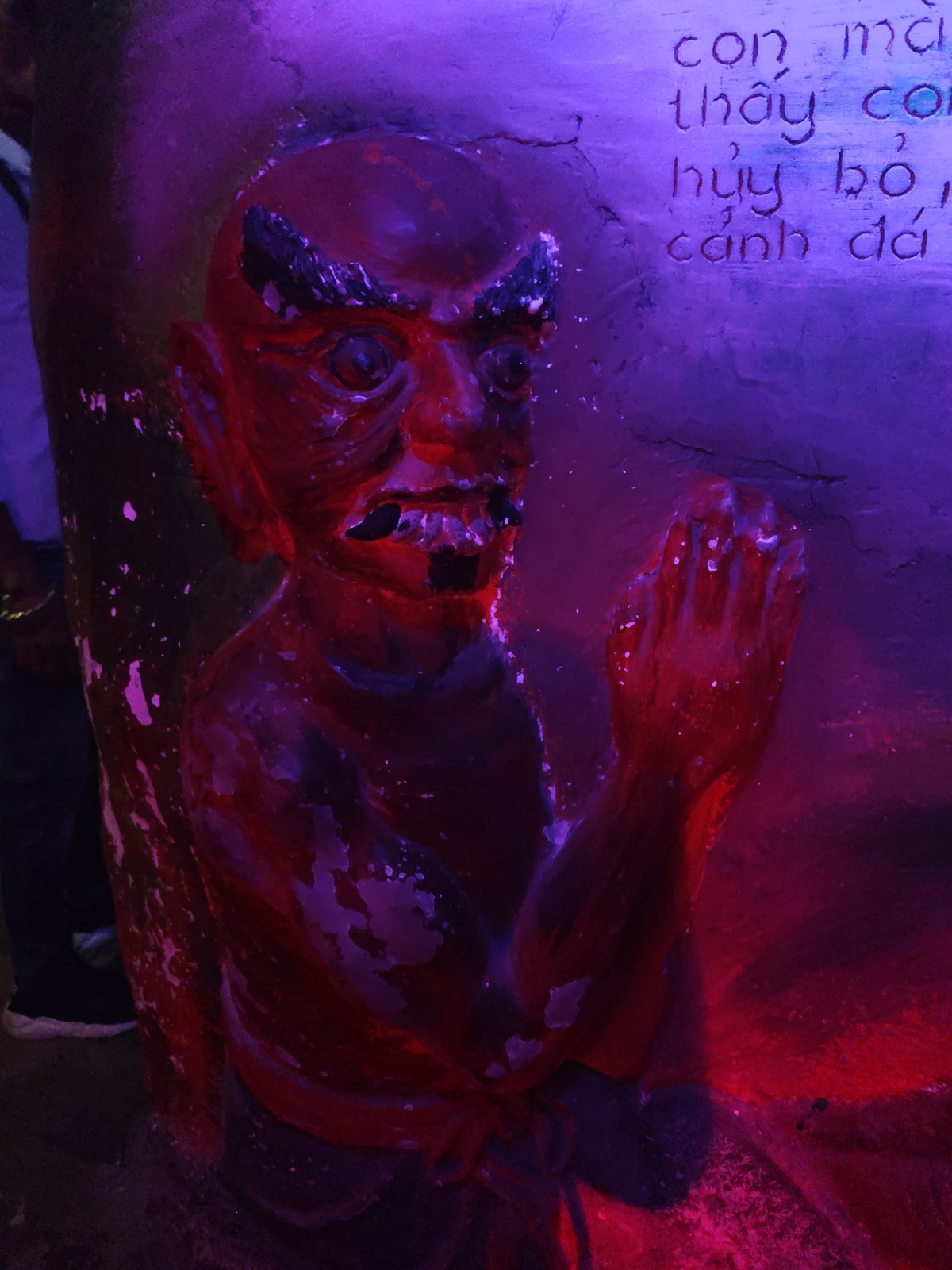 Inside a Thai hell temple's demon statues and Buddhist imagery