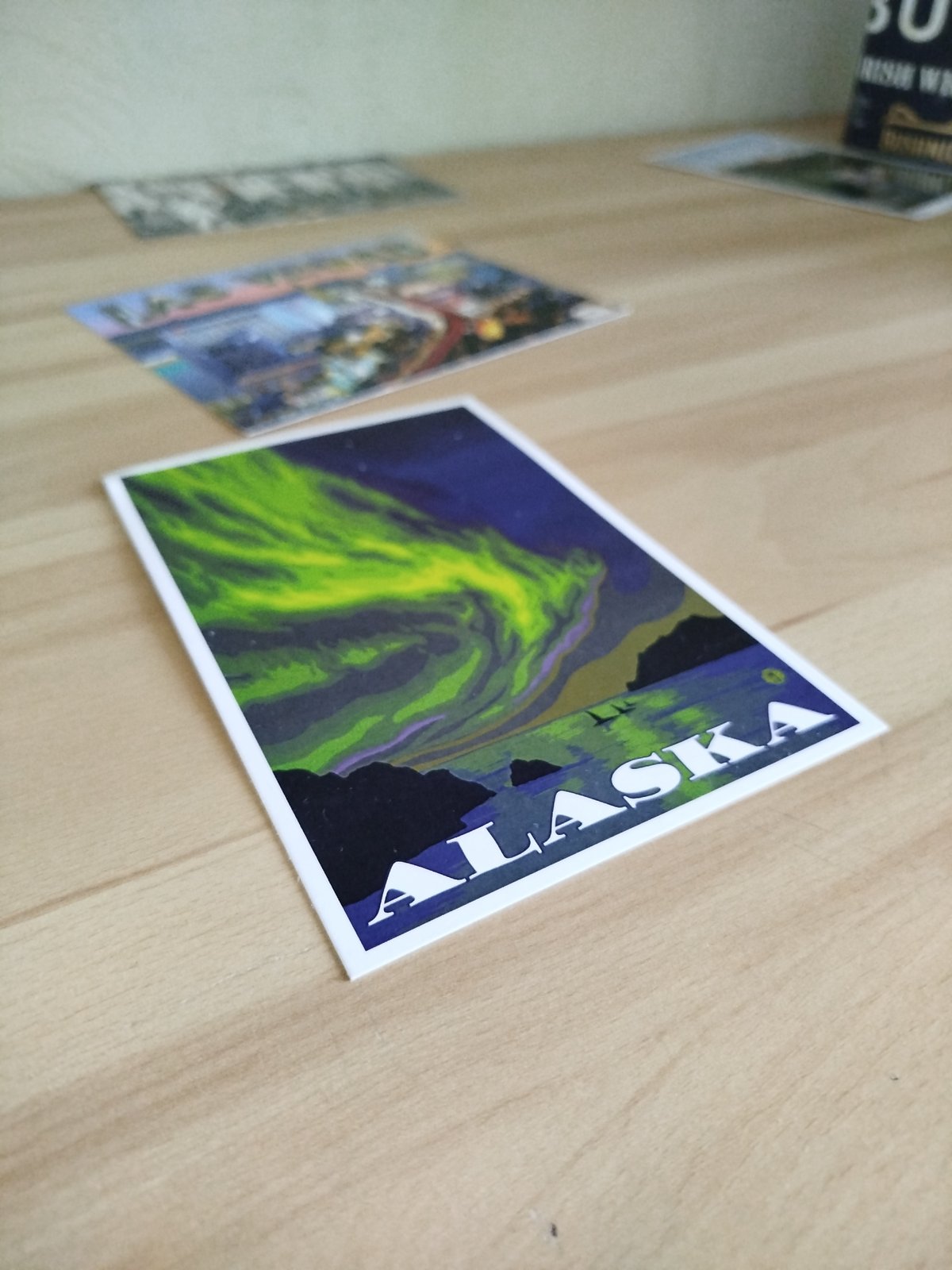 Tourist examines international postcard collection in Varna, Bulgaria