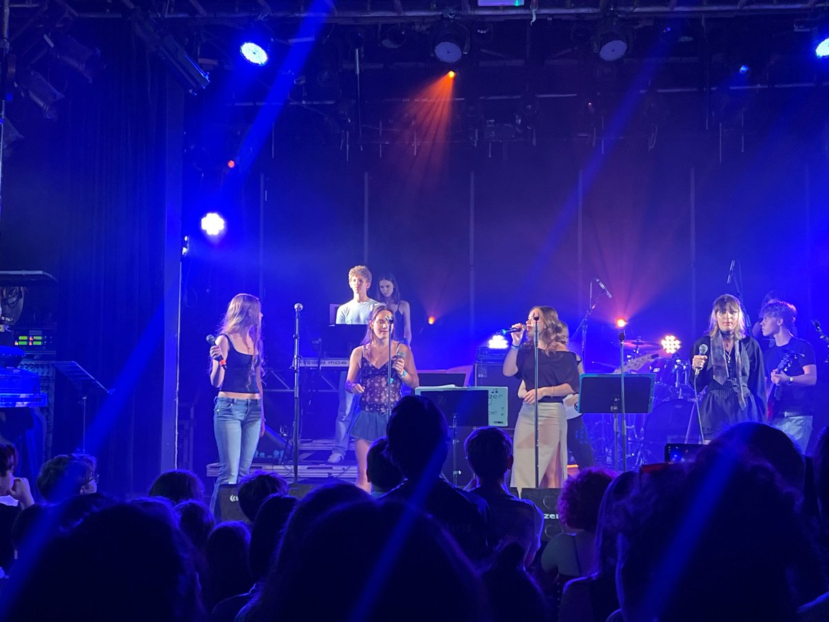 Live music performance captured on illuminated stage in Vienna