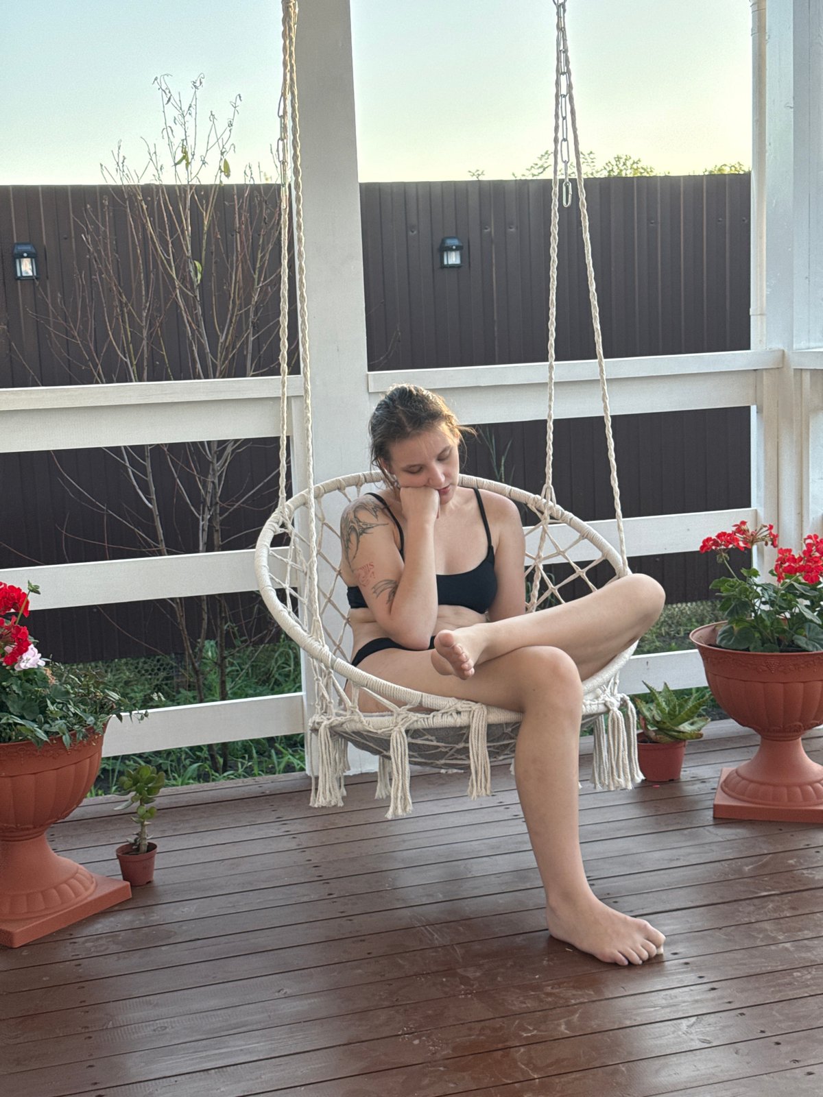 Lazy summer backyard day: hot tub, grill, and a Yorkie