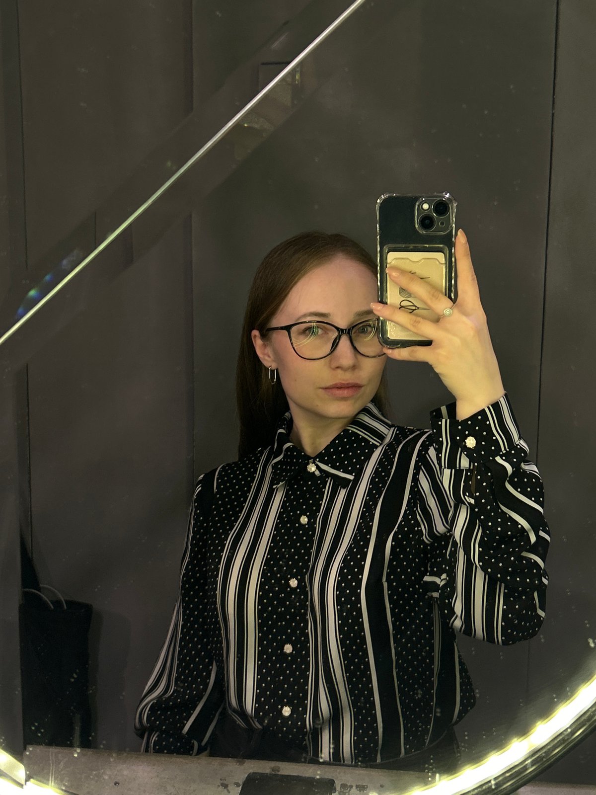 Woman documents evening restaurant and cafe tour in Saint Petersburg