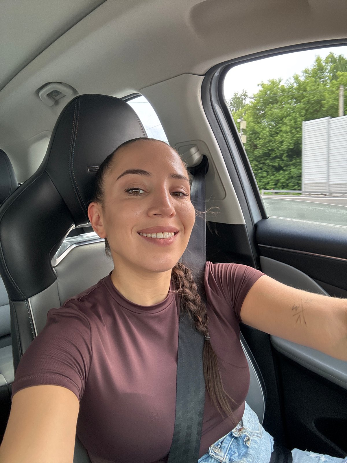 Woman Takes Selfie While Driving in Красная Пахра