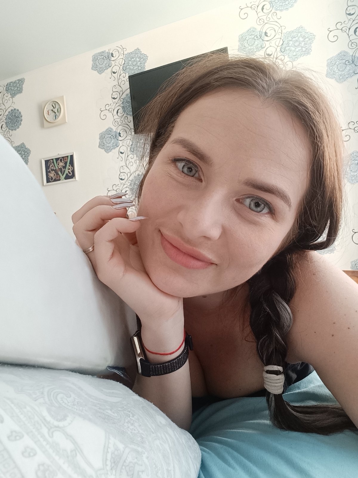 Woman resting on pillow observed in Chaikovsky, Russia