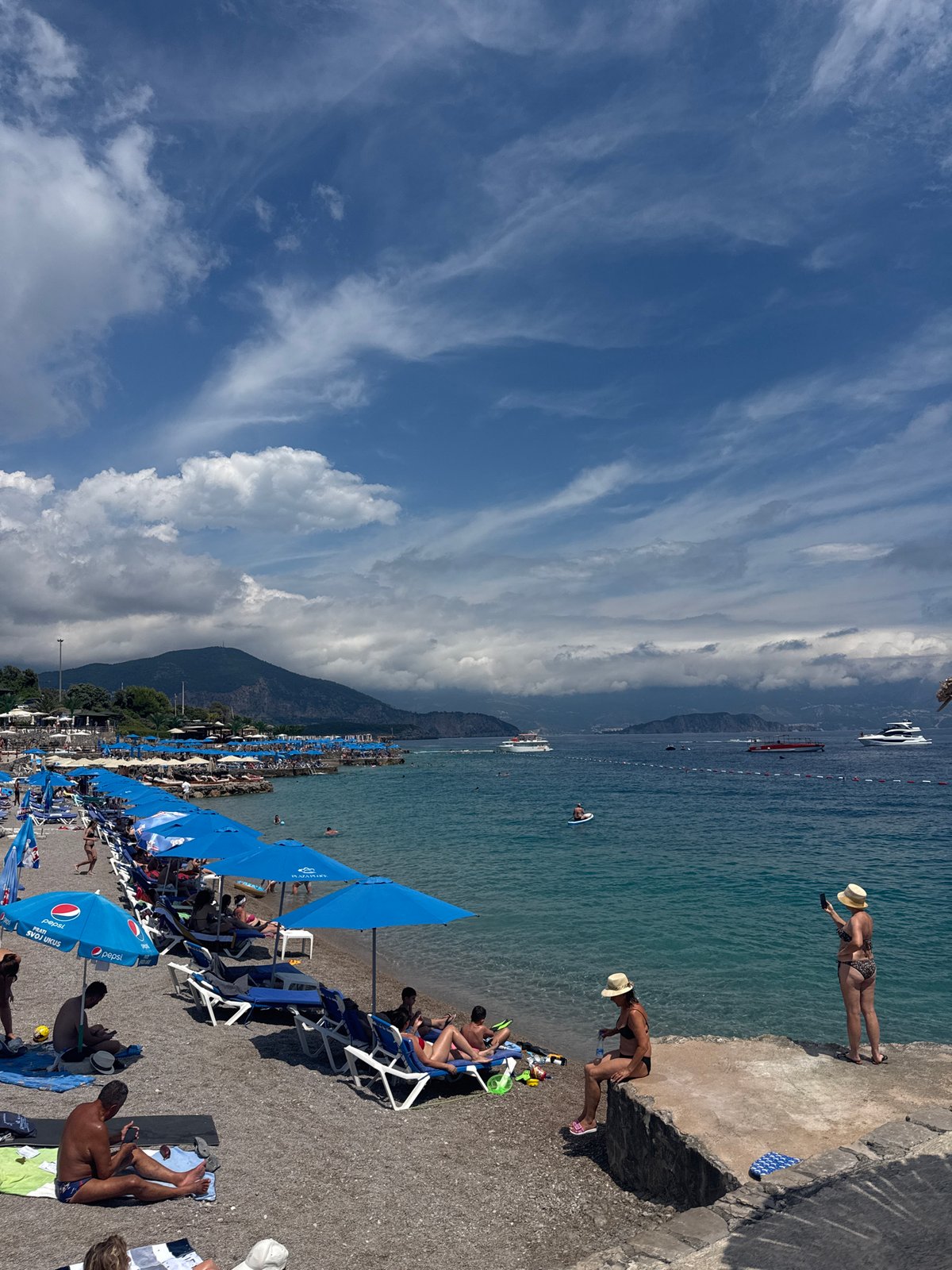 Crowded summer beach day in Prijevor, Montenegro