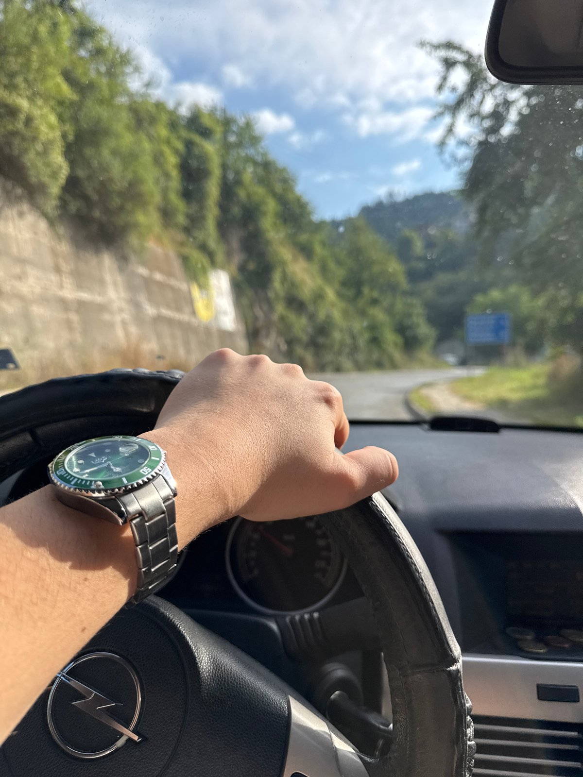 Behind the wheel of an Opel on a rural Bulgarian road