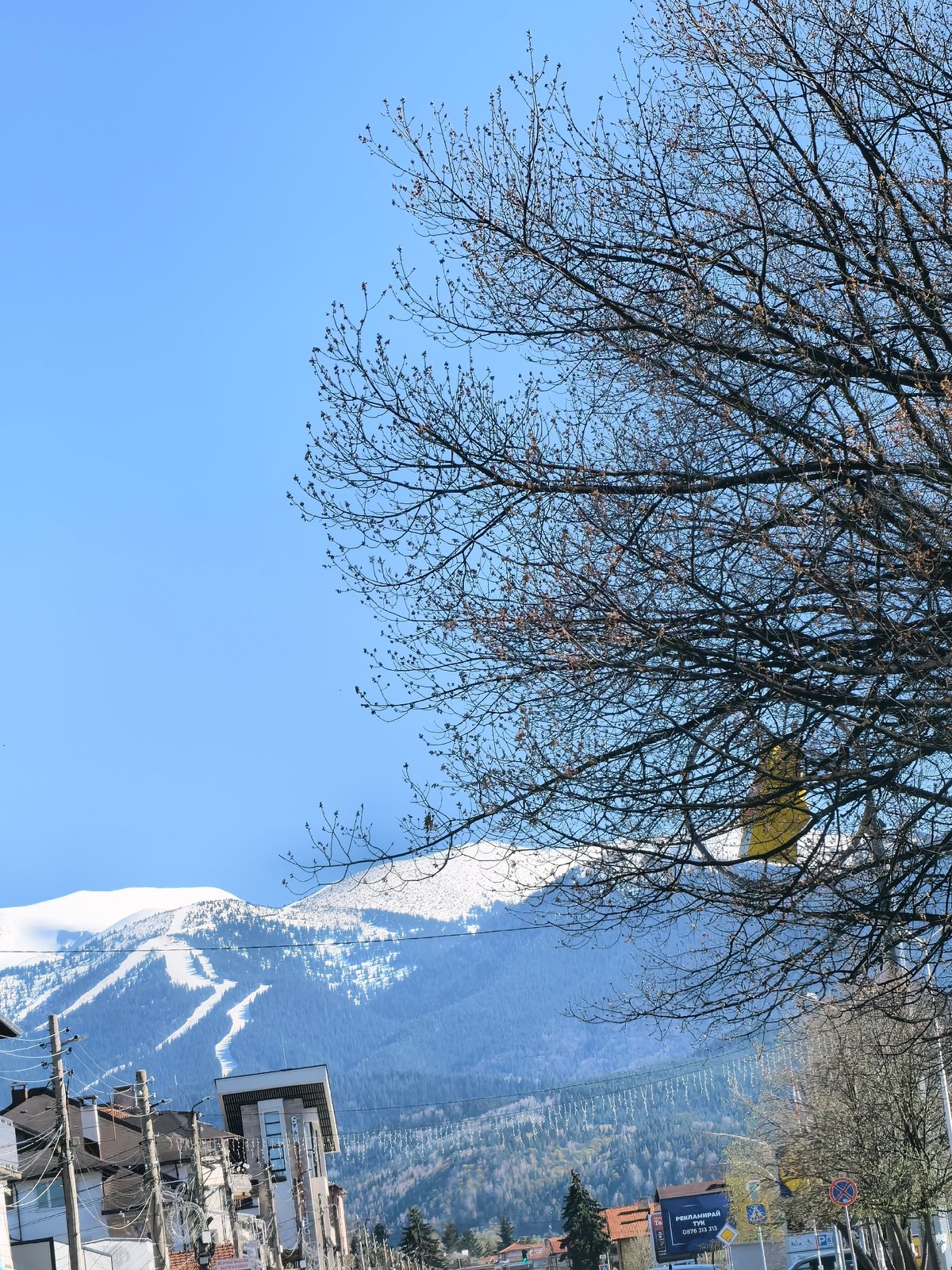 Street scene captured in Samokov with Rila Mountains backdrop