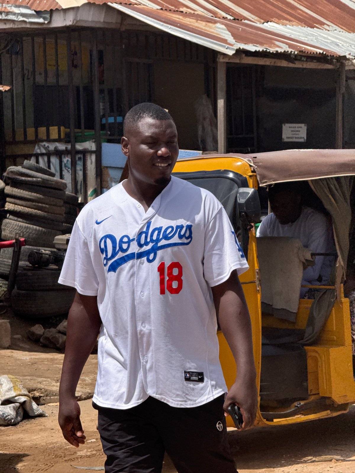 Daily life unfolds across Abuja streets during morning hours
