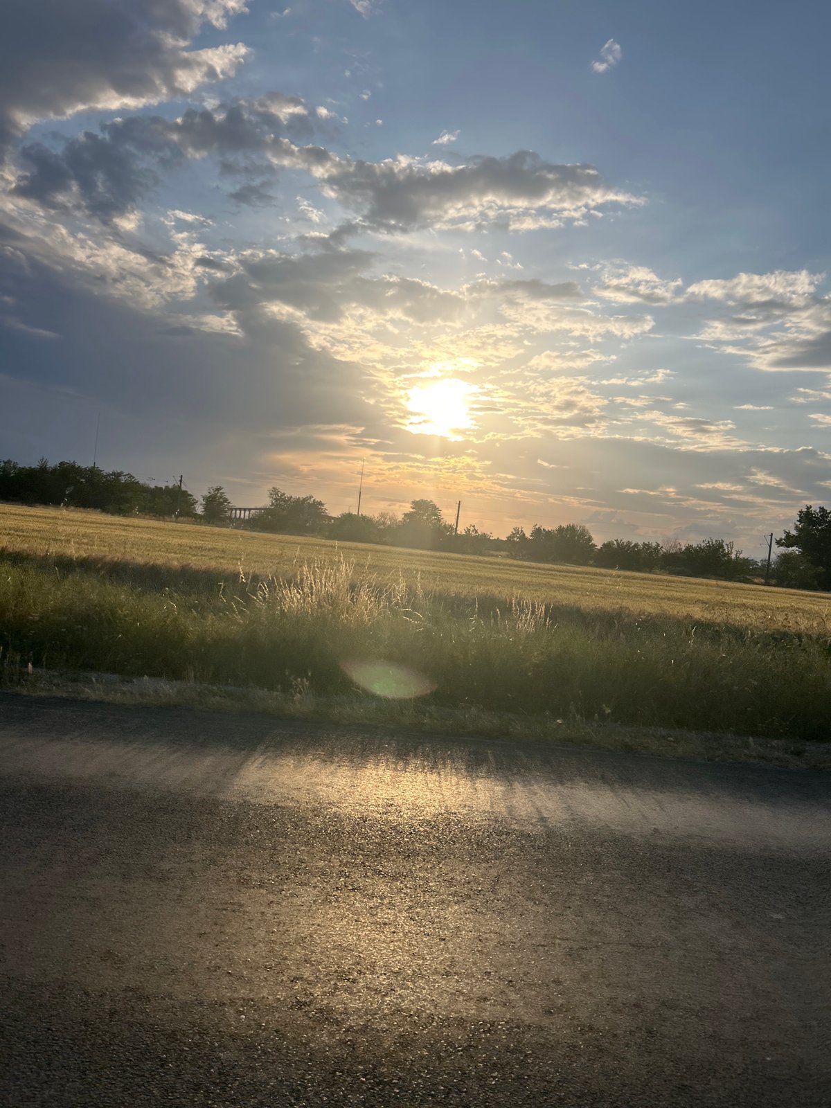 Rural Bulgaria landscape captured under dramatic evening sky conditions