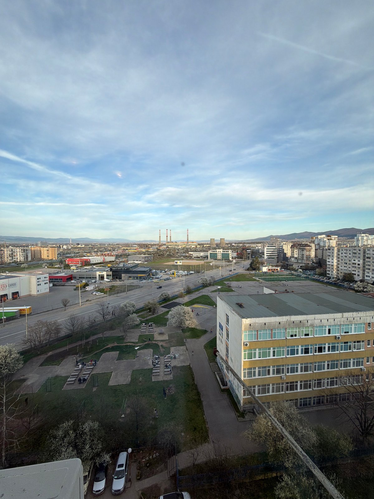 Dual perspectives captured in Sofia: cityscape and indoor portrait