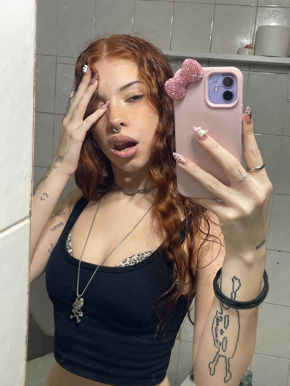 Mirror selfies captured in Buenos Aires bathroom Thursday evening