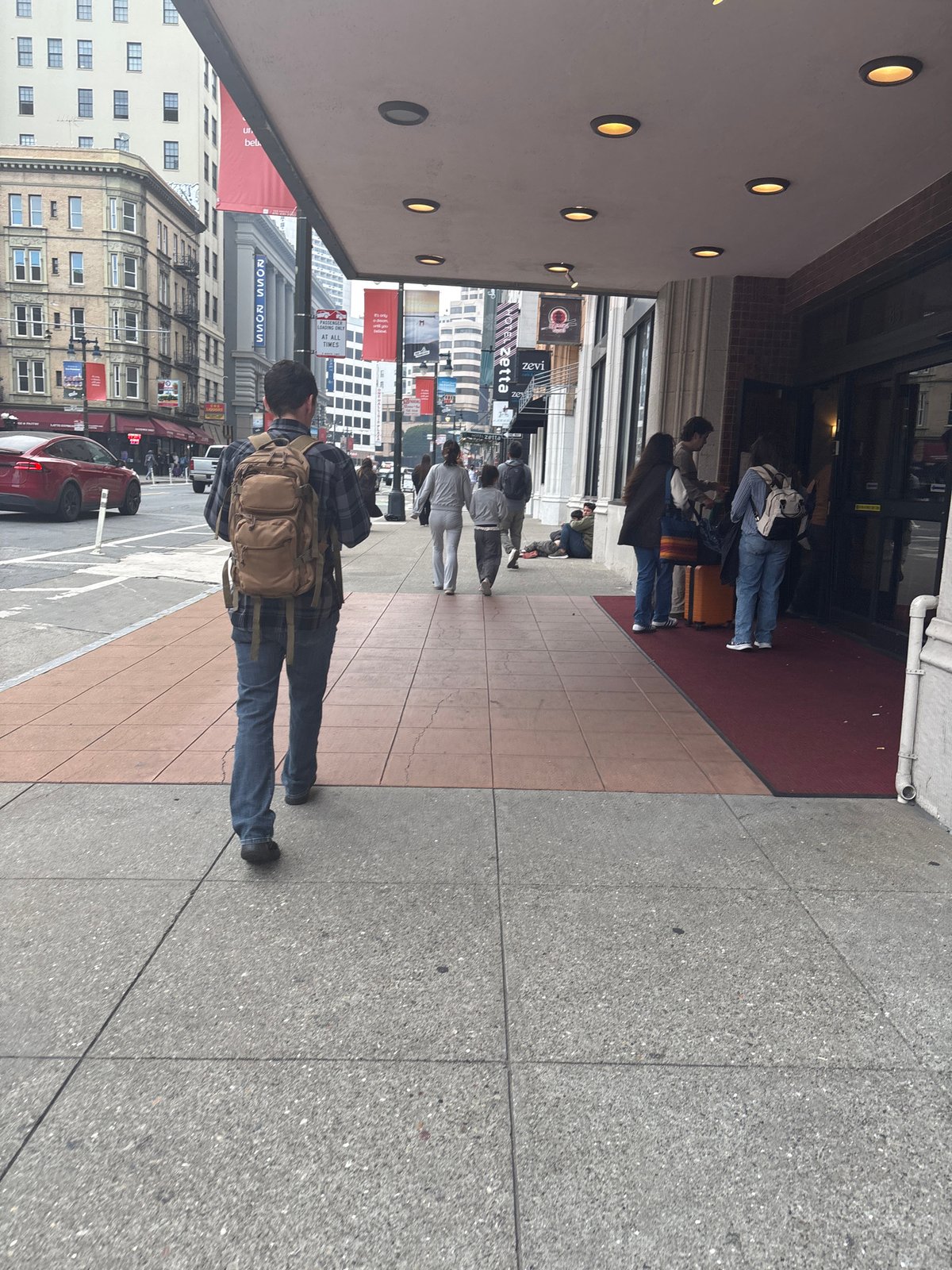 Evening in SF: streets, flags, and a hotel check-in