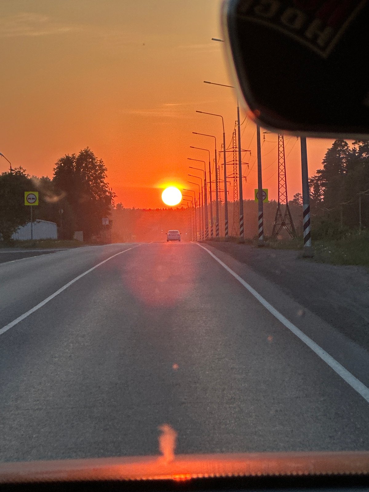 Evening traffic documented on Chaikovsky street at sunset