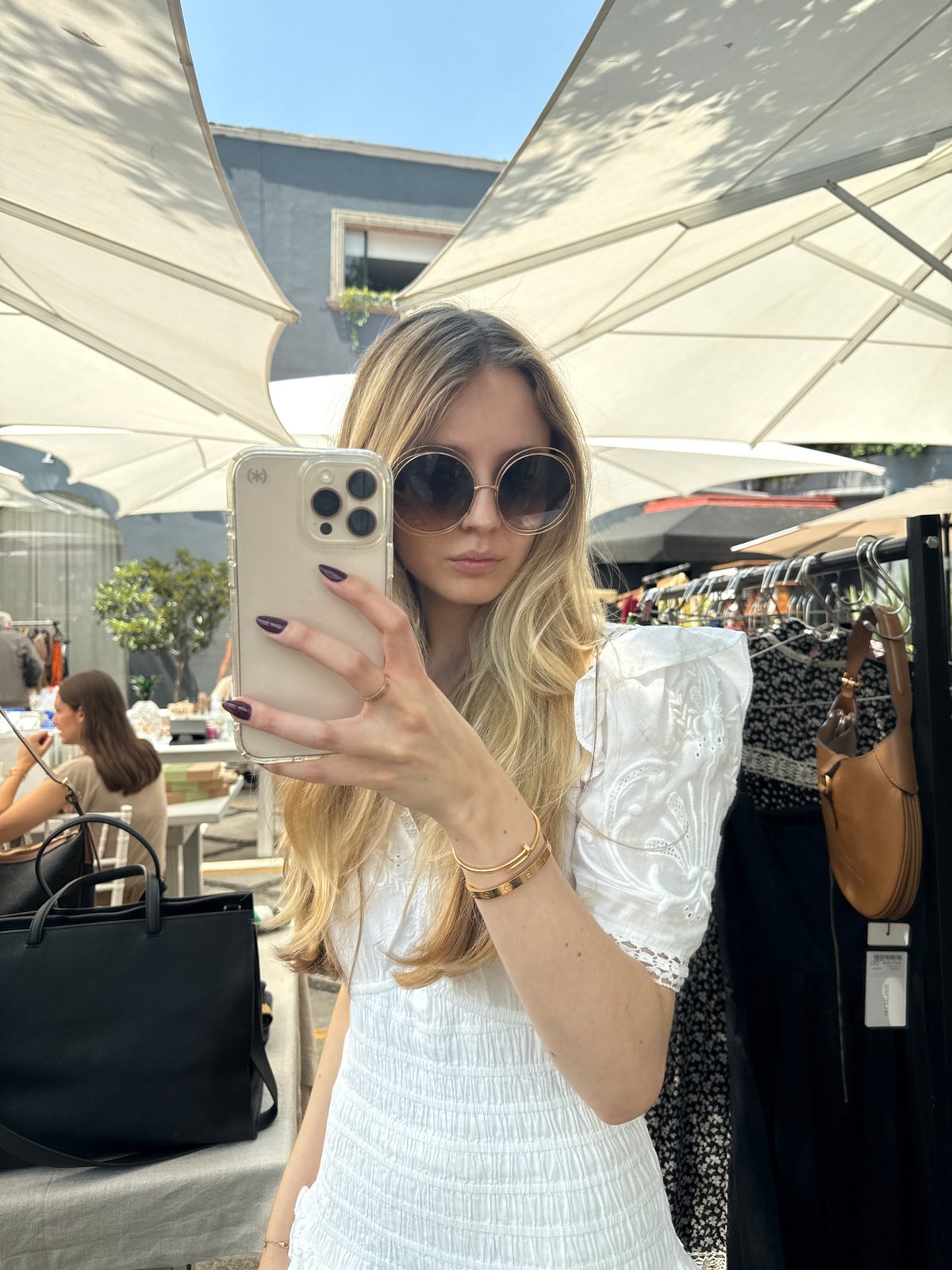 Woman shops luxury goods market in Mexico City