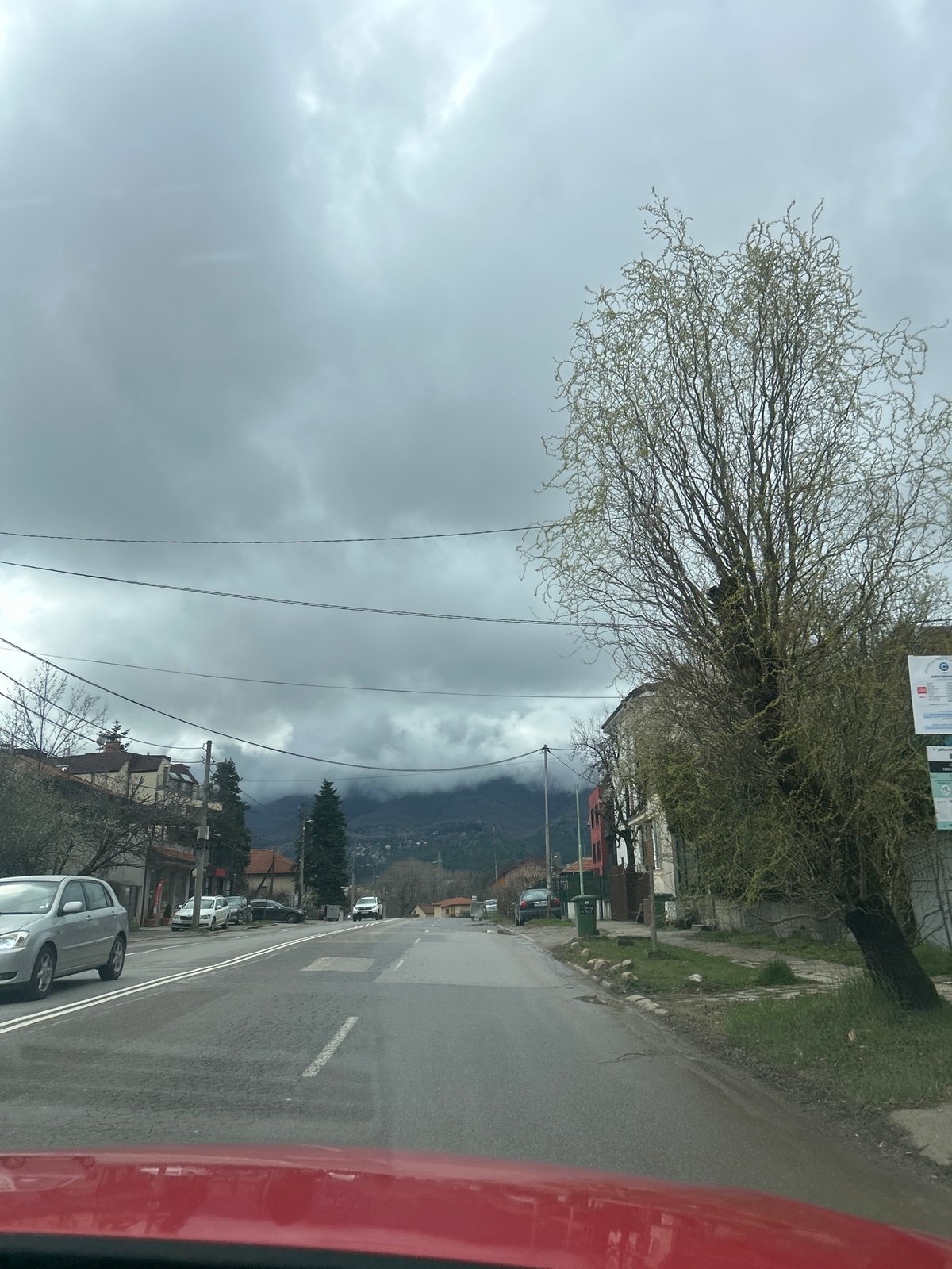 Morning street scene captured from vehicle in Sofia