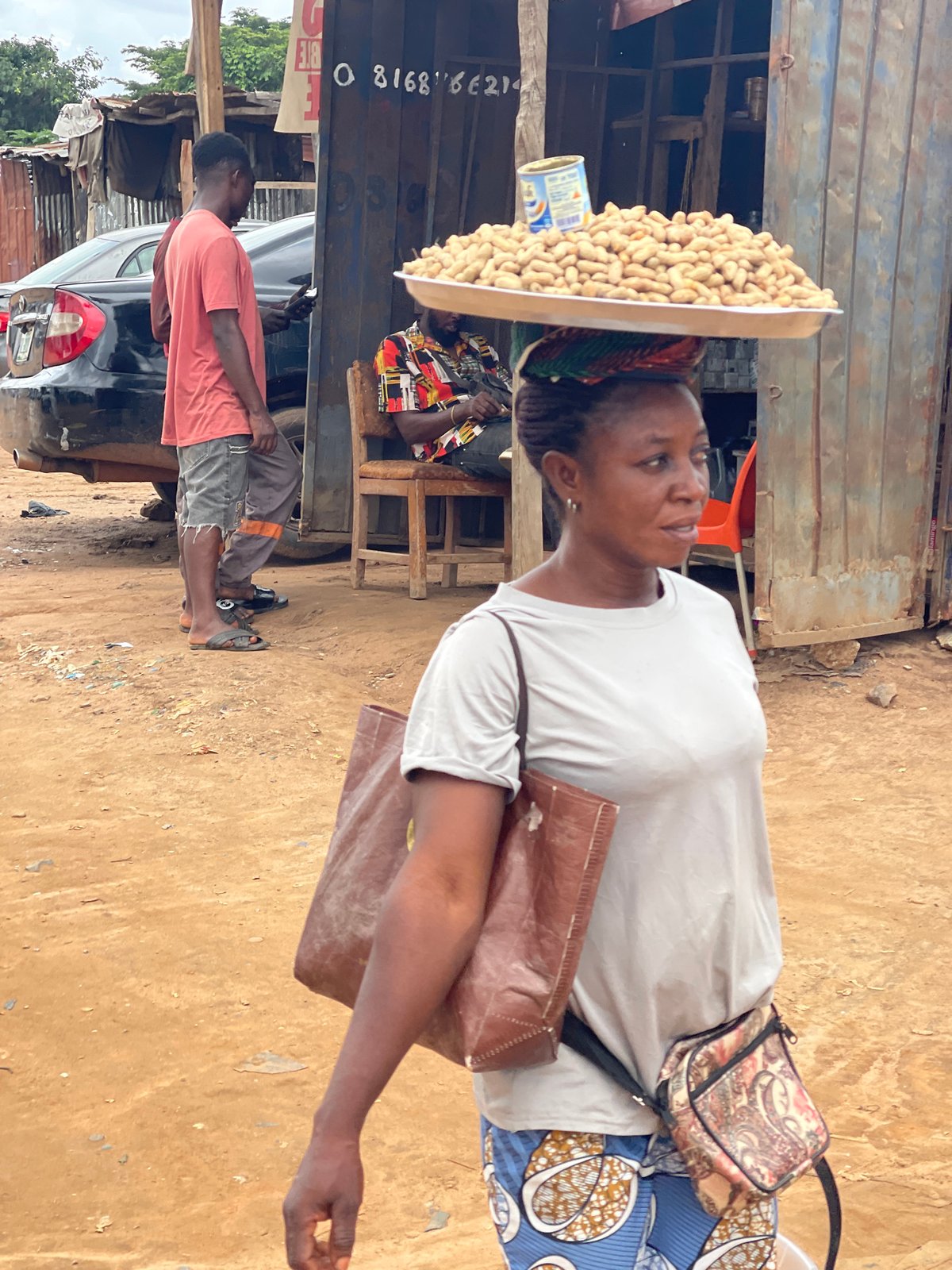 Peanut sellers and street traders at work in Abuja