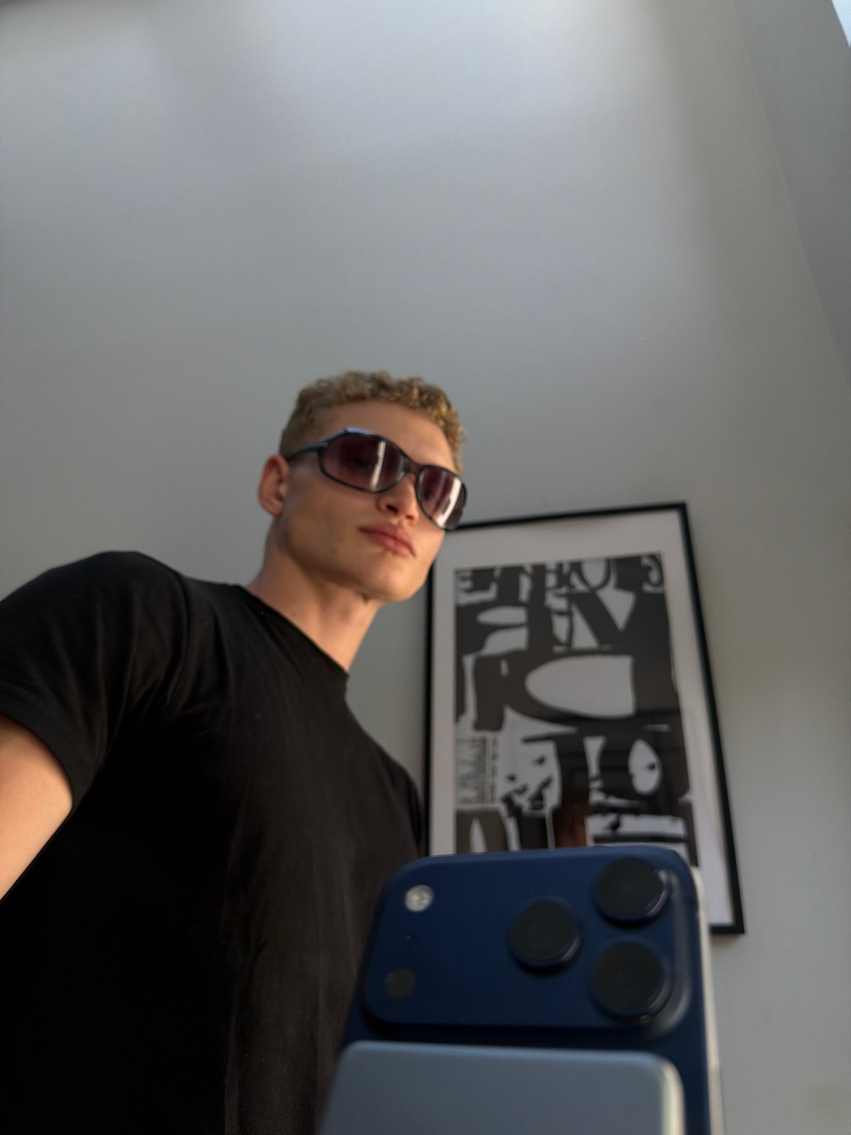 Casual low-angle selfie on a summer afternoon in London