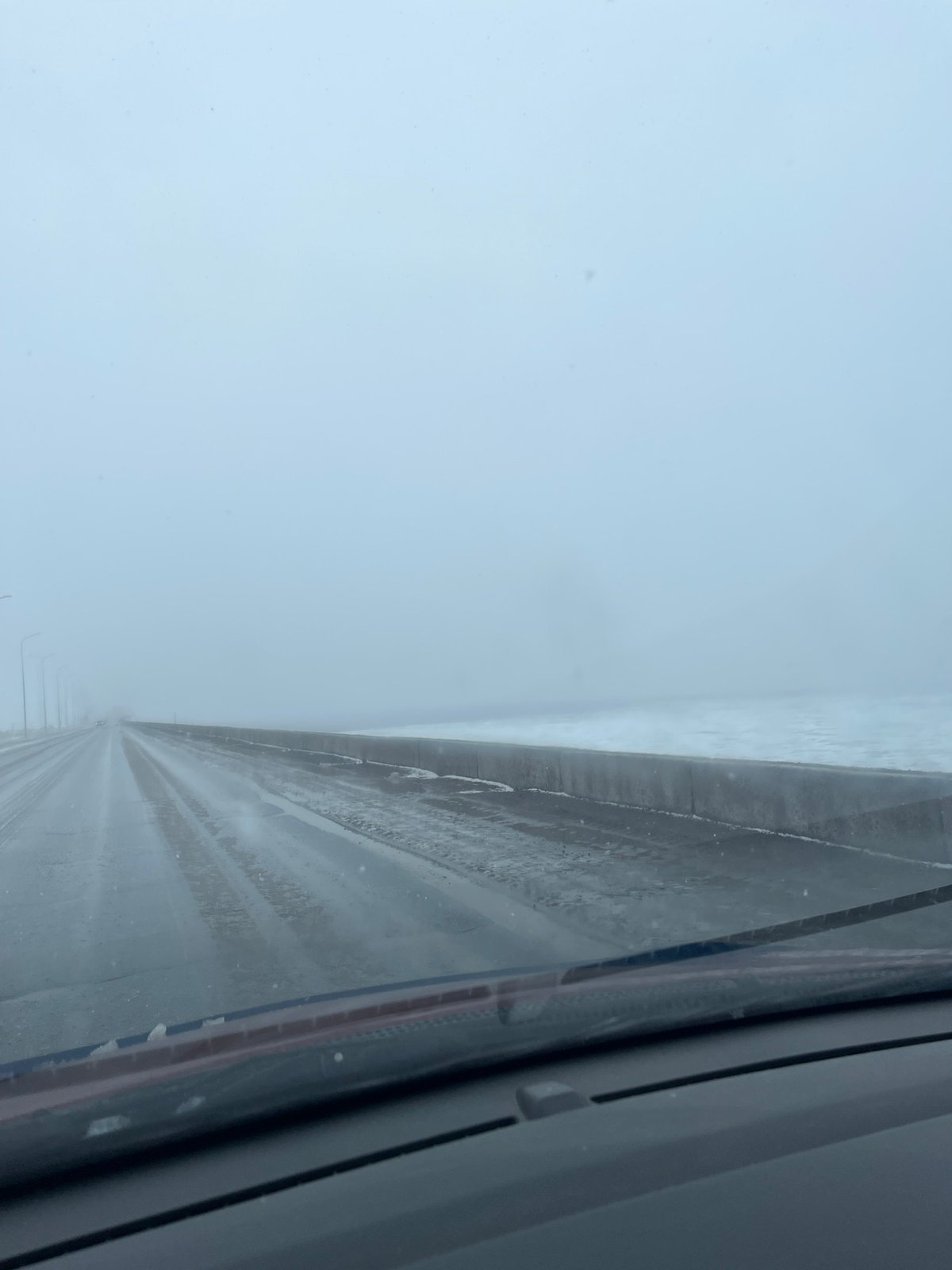 Wet road conditions documented in Chaikovsky, Russia