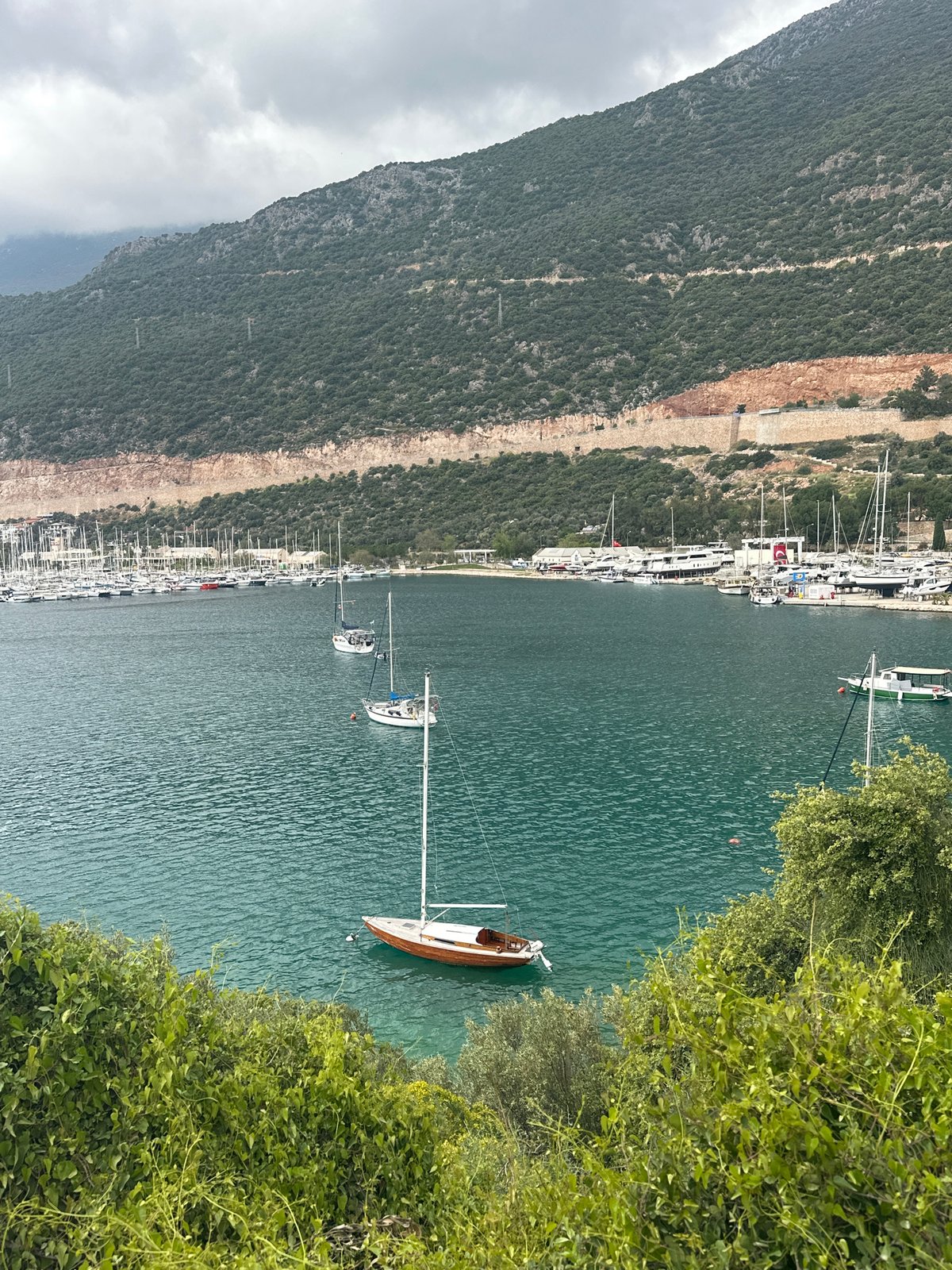 Afternoon leisure moments captured in scenic Kaş, Turkey marina