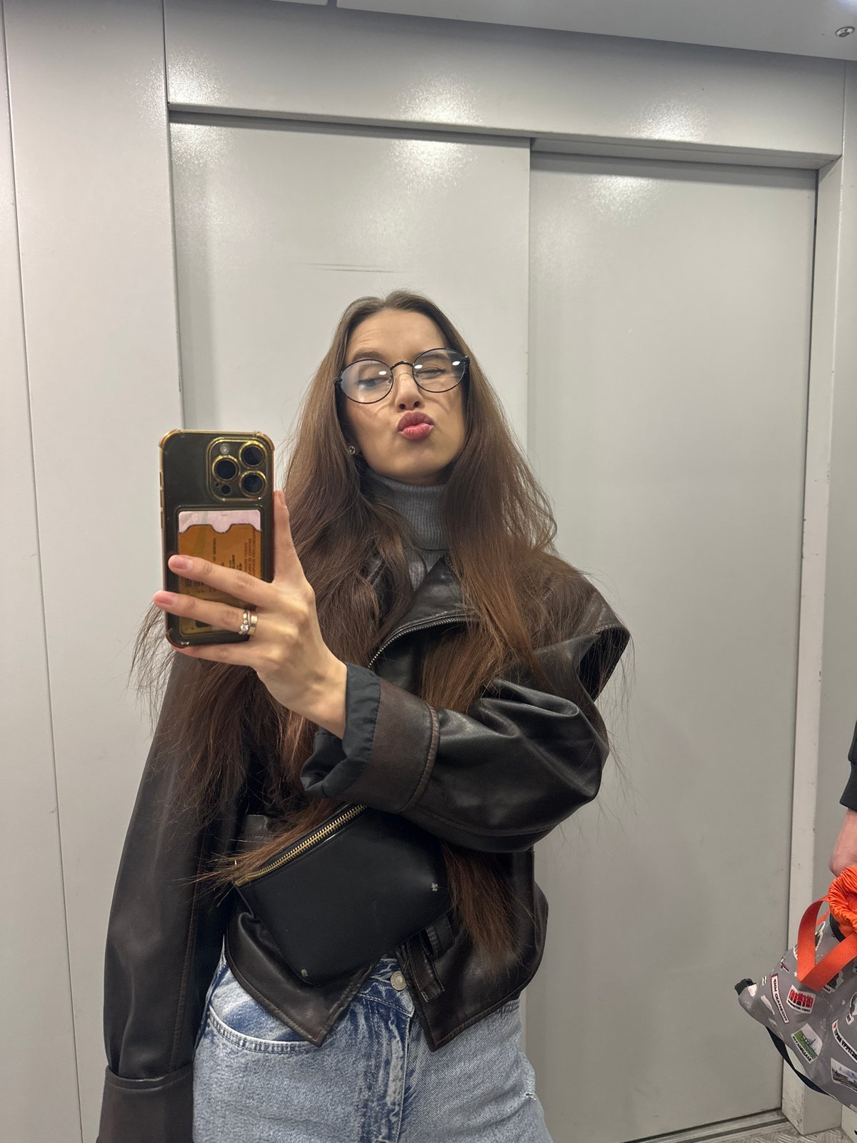 Woman Takes Selfies in Yekaterinburg Elevator