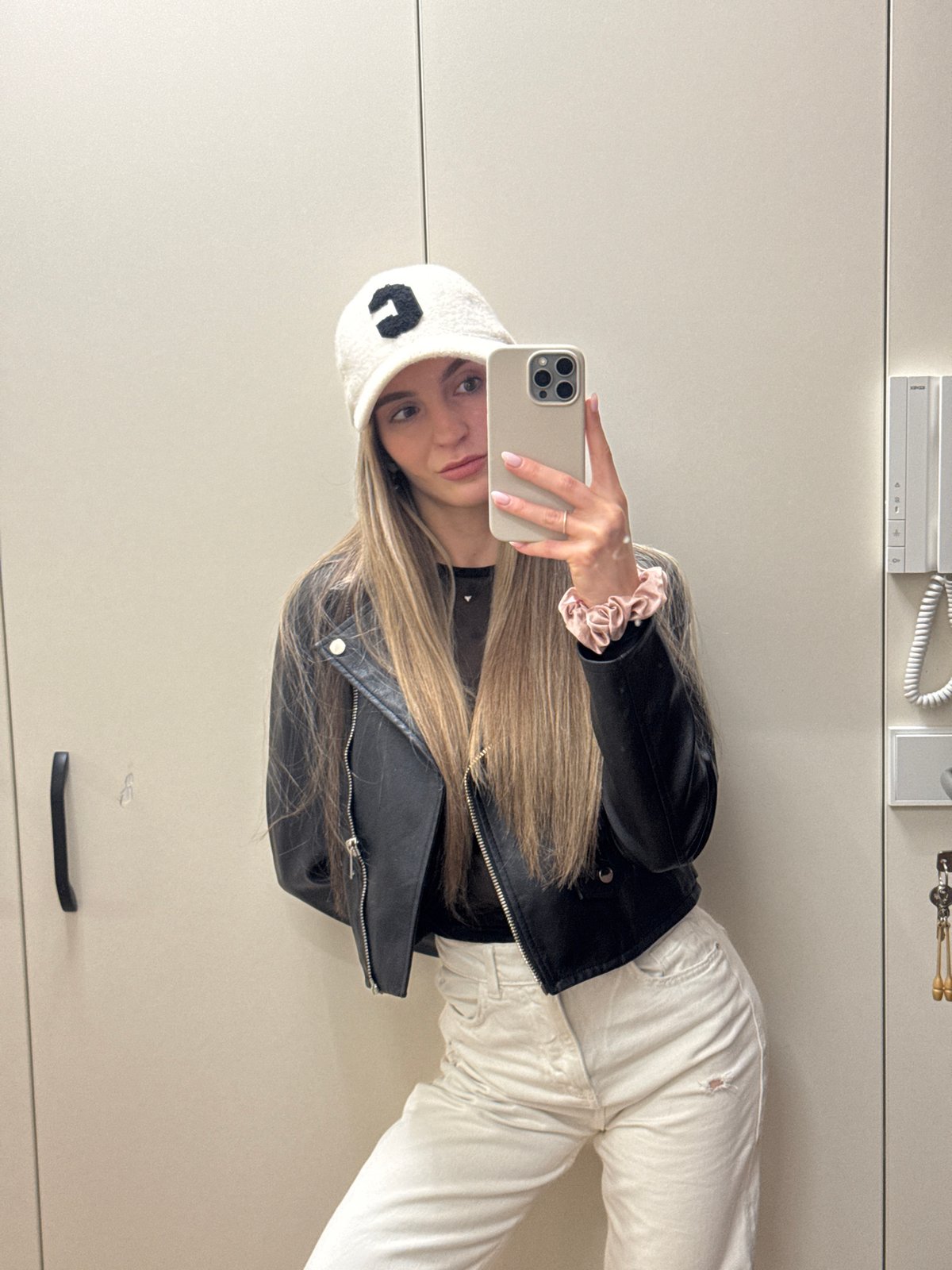 Young woman takes mirror selfie in Sofia