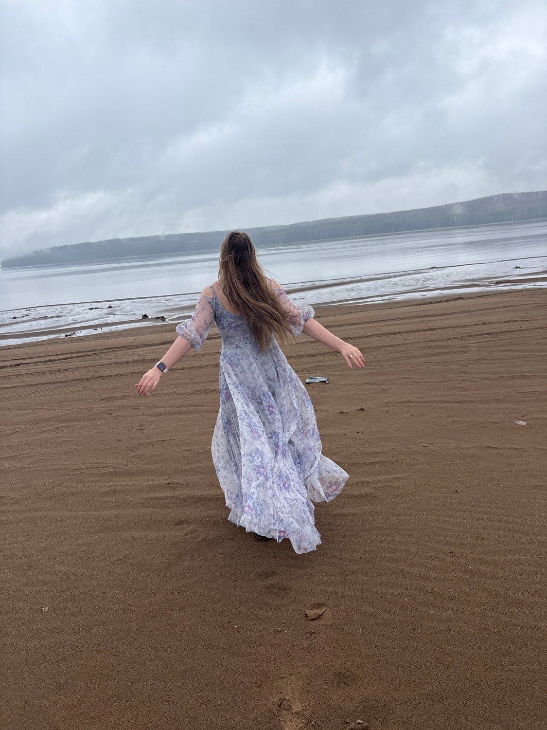 Person enjoys quiet beach time in Chaikovsky, Russia